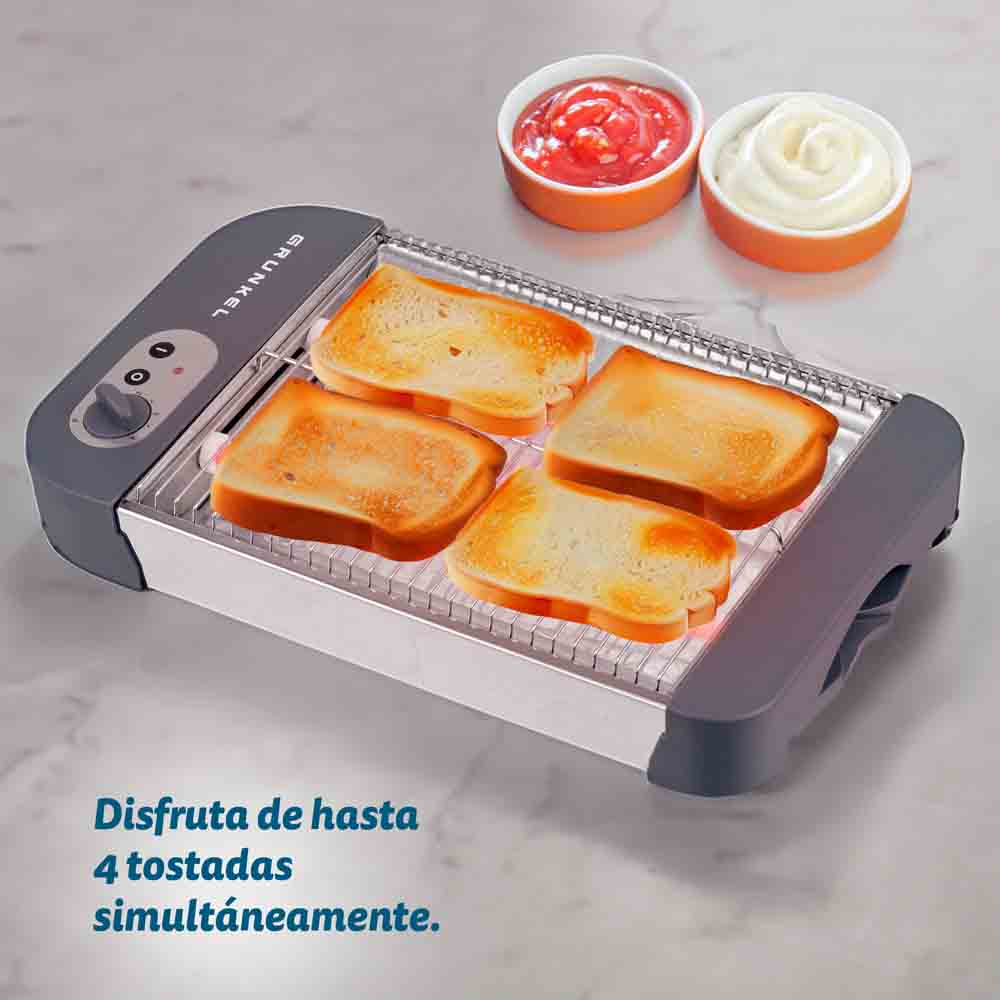 Un tostapane con quattro fette di toast. Ketchup e maionese in piccole ciotole.