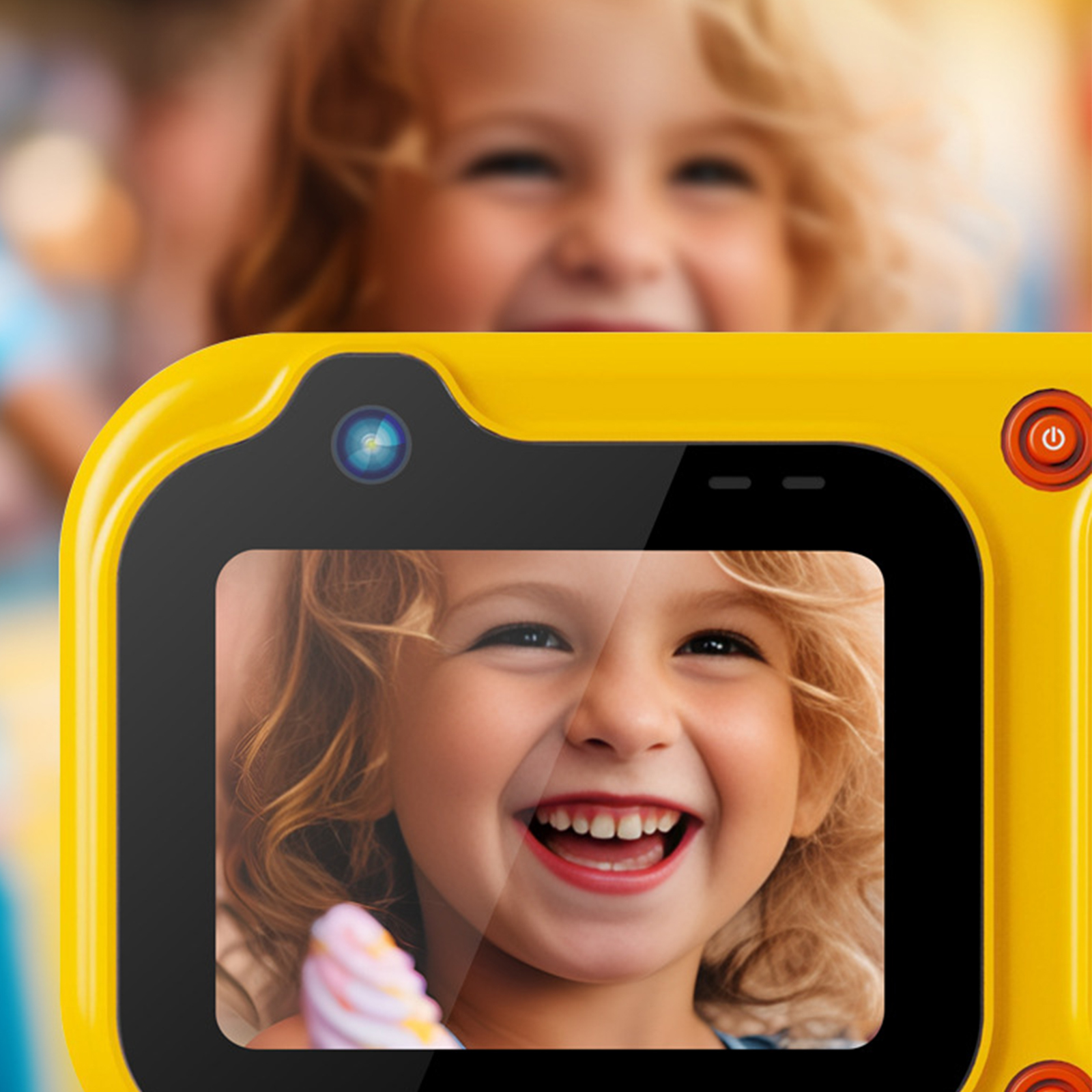 Kinderkamera, zeigt Foto eines lächelnden Mädchens auf dem Bildschirm. Die Kamera ist gelb, hat einen Knopf.