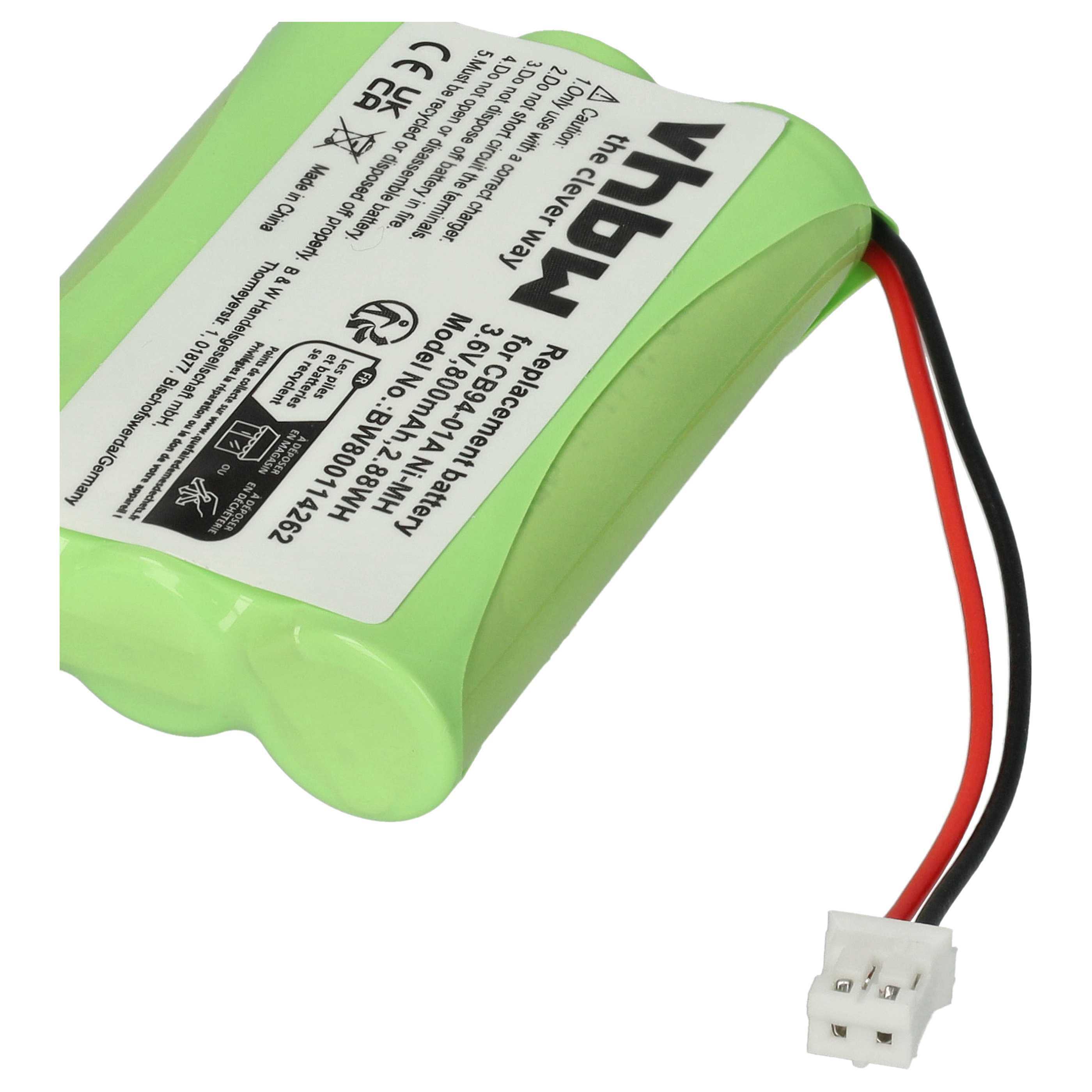 Grün-weiße zylindrische Batterie mit Kabeln und Stecker, mit Warnhinweisen und Etiketten.