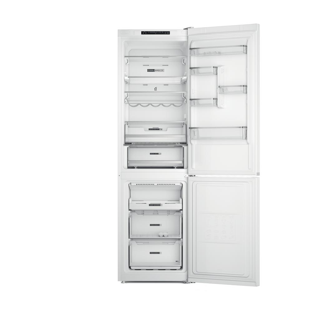 Refrigerador blanco con puertas abiertas. Se ven estantes y cajones interiores. El fondo es blanco.