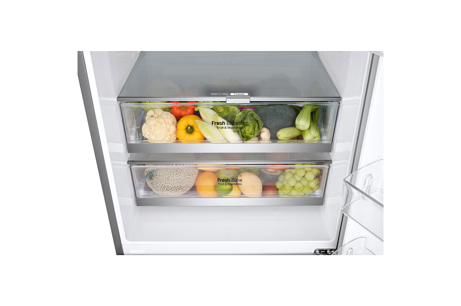 Nahaufnahme von Kühlschubladen mit Gemüse und Obst, beschriftet mit 'Fresh Balancer'.