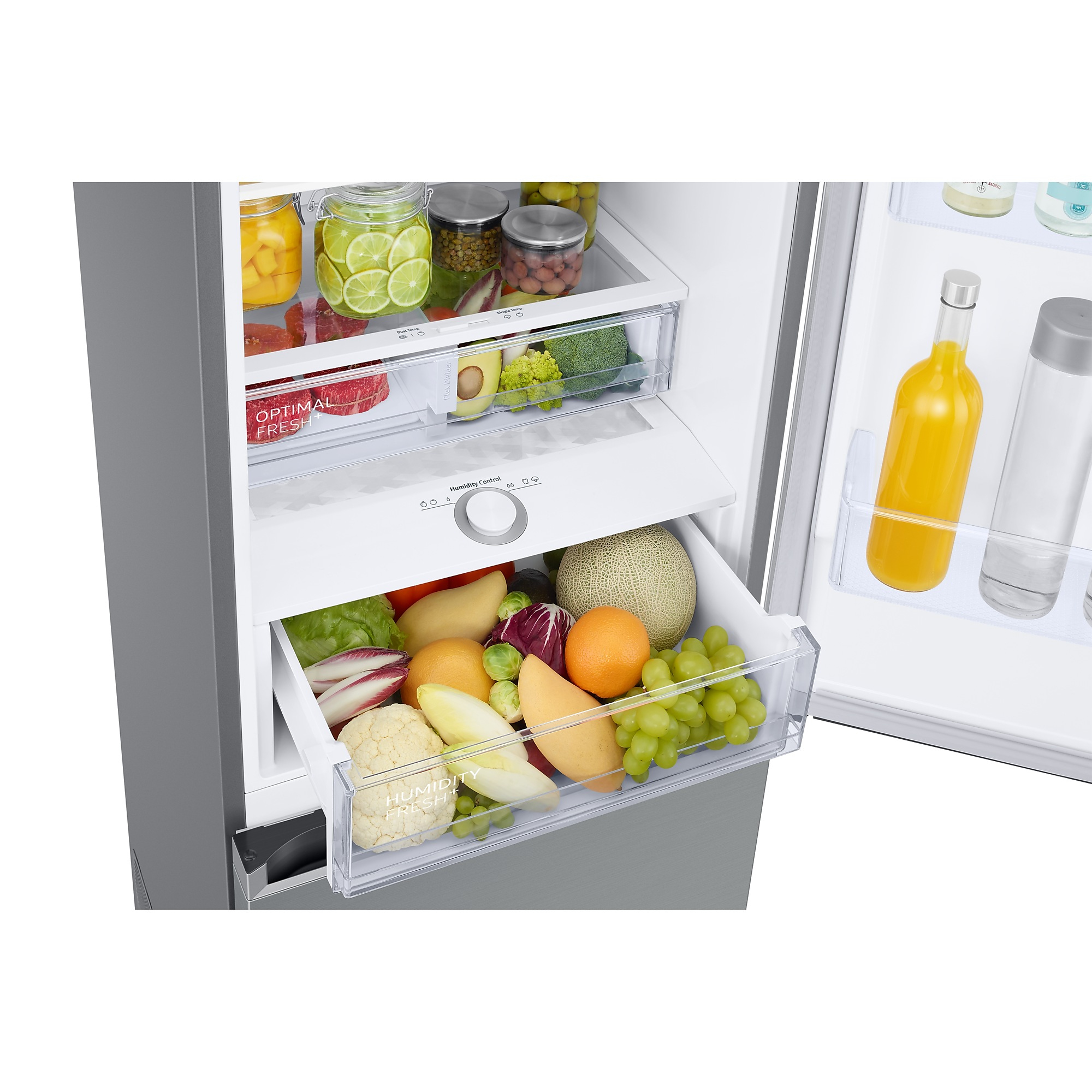 Primer plano de los cajones del refrigerador, que muestra varias frutas y verduras.