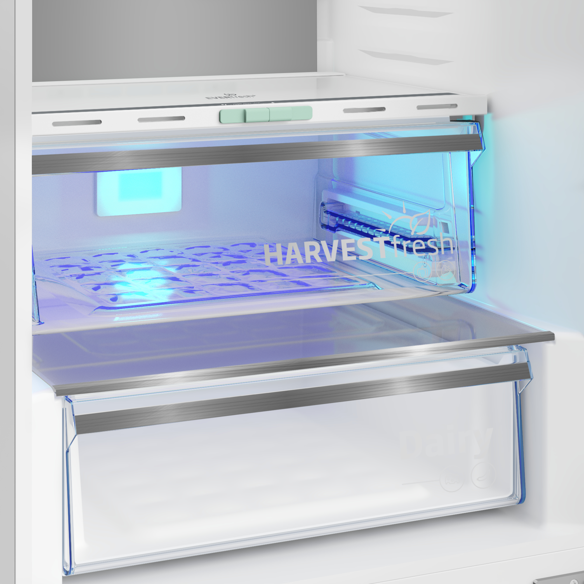 Wnętrze lodówki z szufladą. Szuflada oświetlona niebieskim światłem, z napisem HarvestFresh.