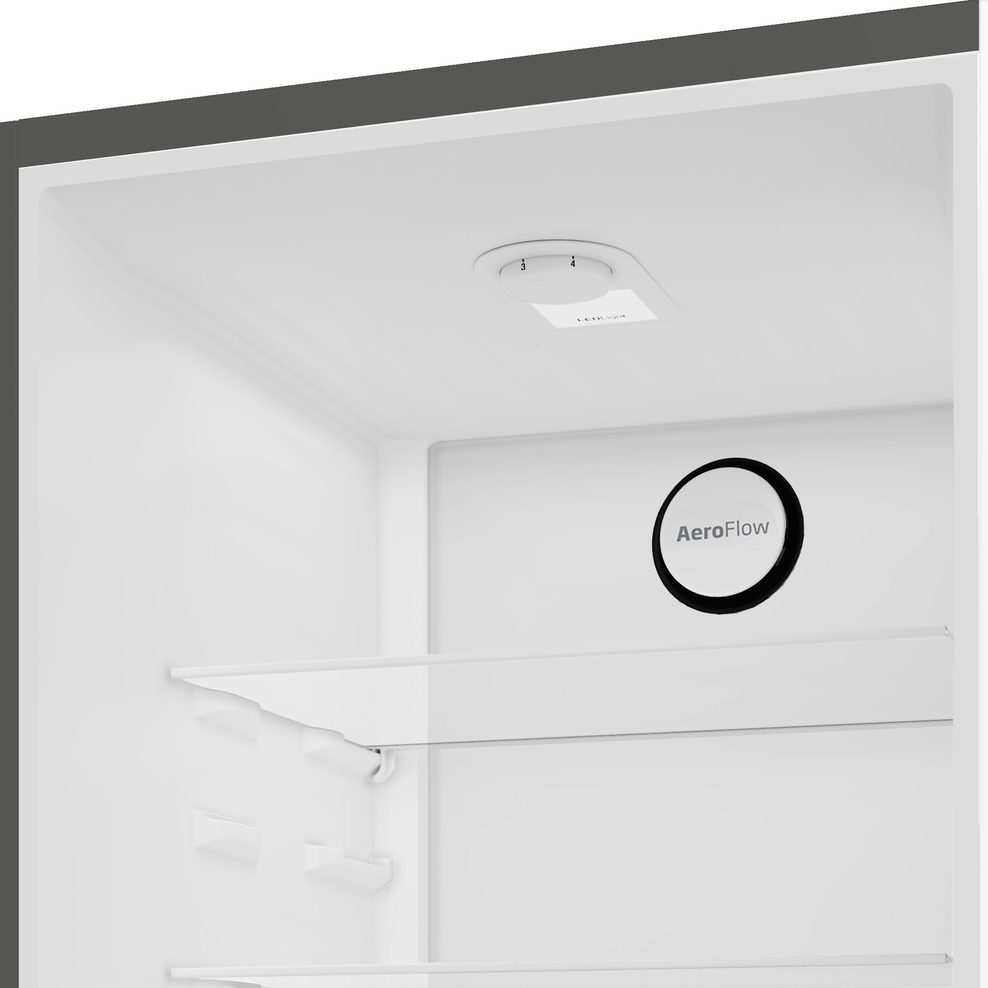 Wnętrze lodówki, pokazujące oświetlenie i białą powierzchnię z tekstem.