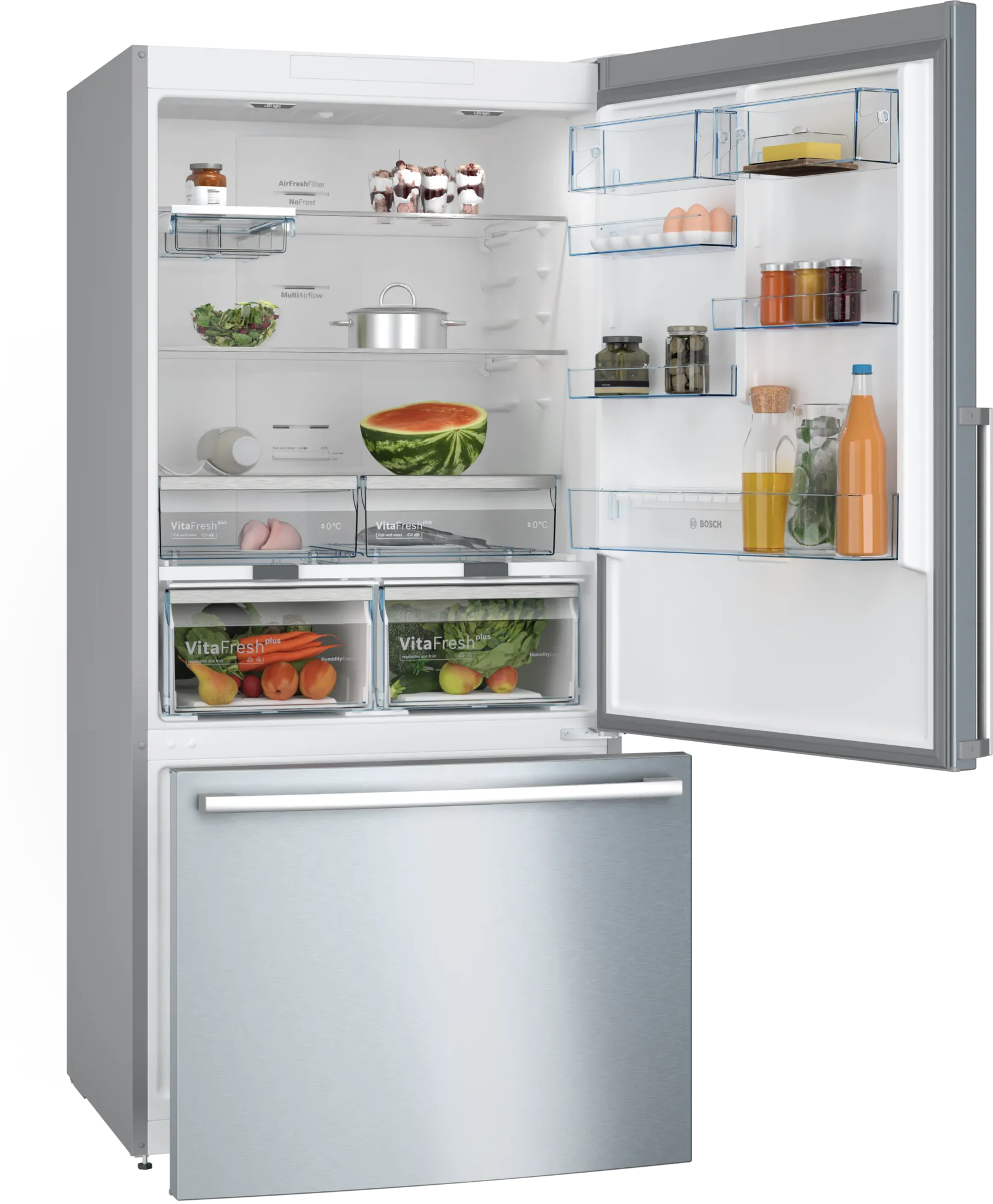 Geöffneter Kühlschrank mit Lebensmitteln. Hat Obst, Gemüse, Gläser und eine Wassermelone.