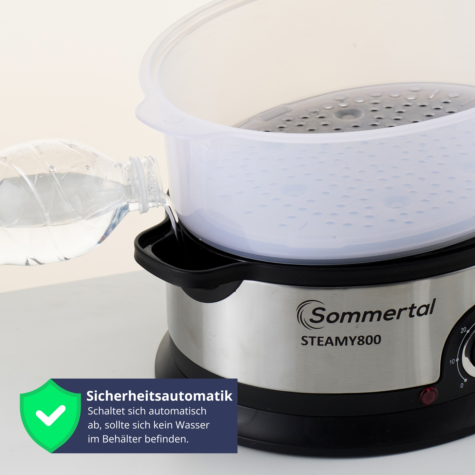 Dampfgarer, Wasser wird eingefüllt. Text: 'Sicherheitsautomatik' und 'Sommertal'.