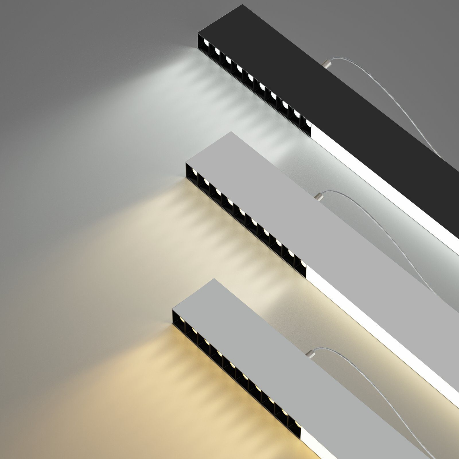 Drei Lichter, drei verschiedene Farben, weiß, silber und schwarz. Die Lichter sind in einer Reihe.