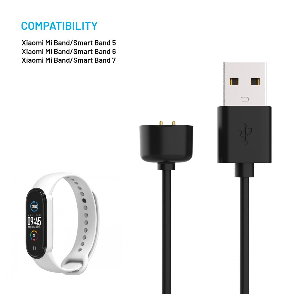 Eine weiße Mi Band Smartwatch, Ladegerät und USB-Kabel.