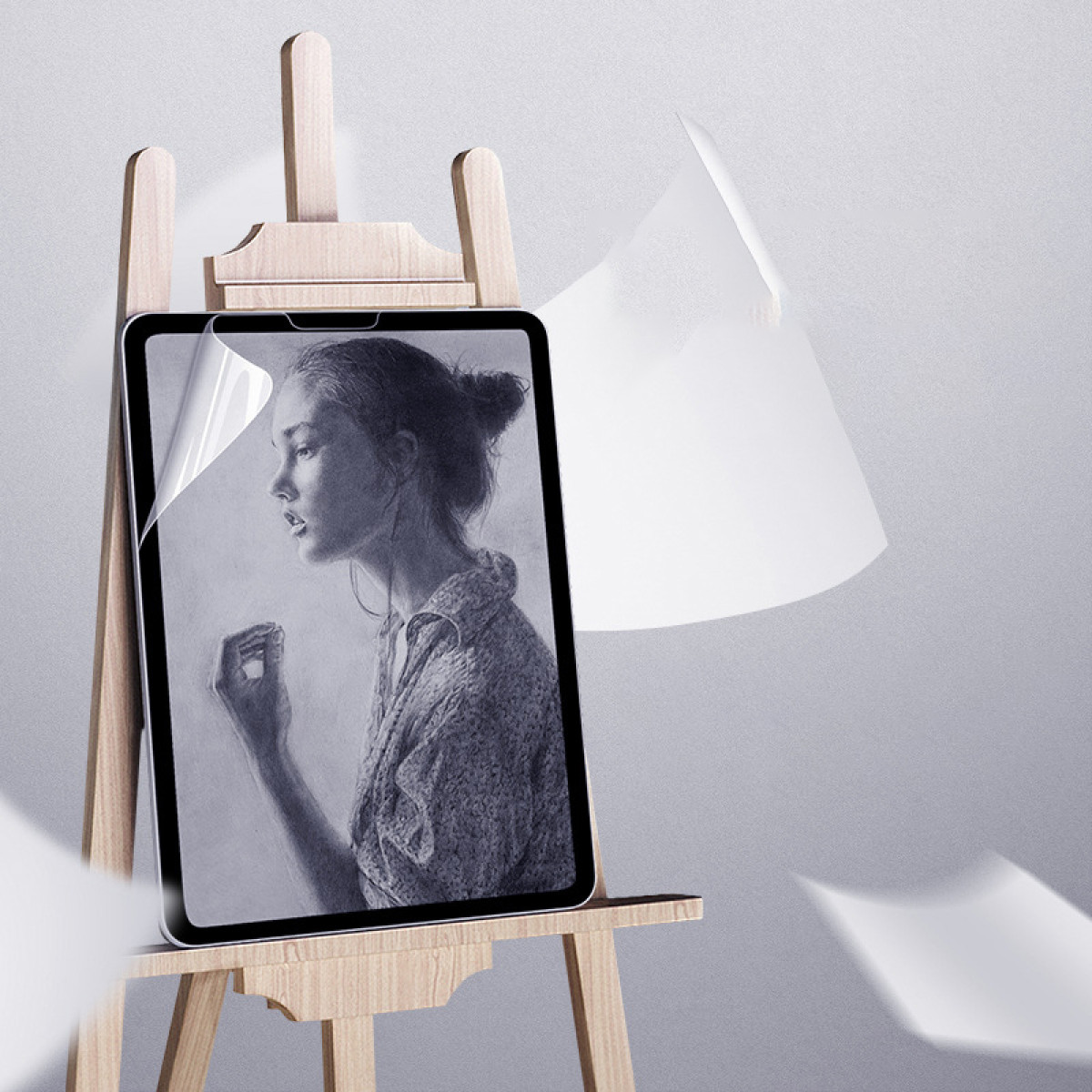 Een iPad op een ezel. Het toont een grijswaarden portret.