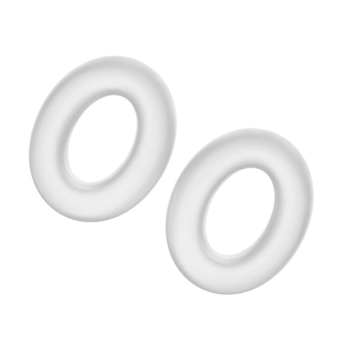 Twee heldere, donutvormige siliconen ringen. Witte, gladde oppervlakte. Geïsoleerd op witte achtergrond.