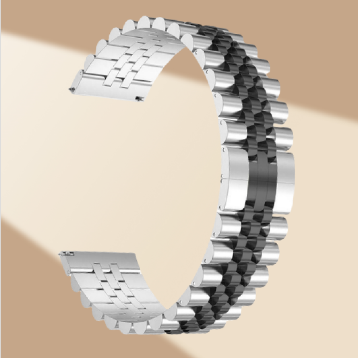 Cinturino d'argento con sezione centrale nera, su sfondo beige.