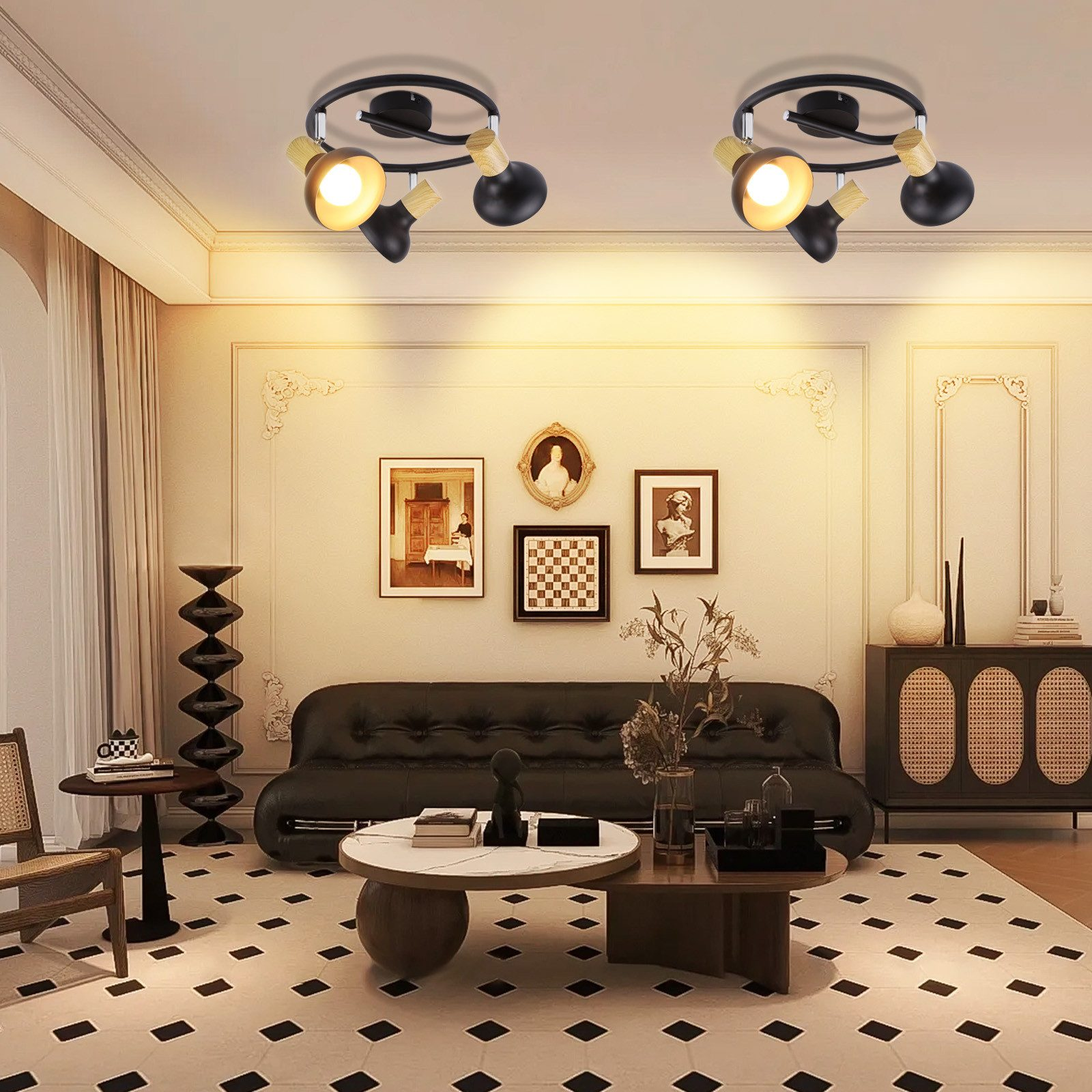 Dwa reflektory sufitowe w pokoju z meblami i dziełami sztuki.