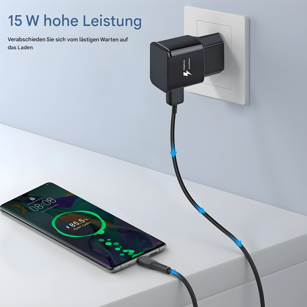 Ein schwarzes Telefon wird aufgeladen und ist mit einem schwarzen Ladegerät verbunden, das in eine weiße Steckdose gesteckt ist.