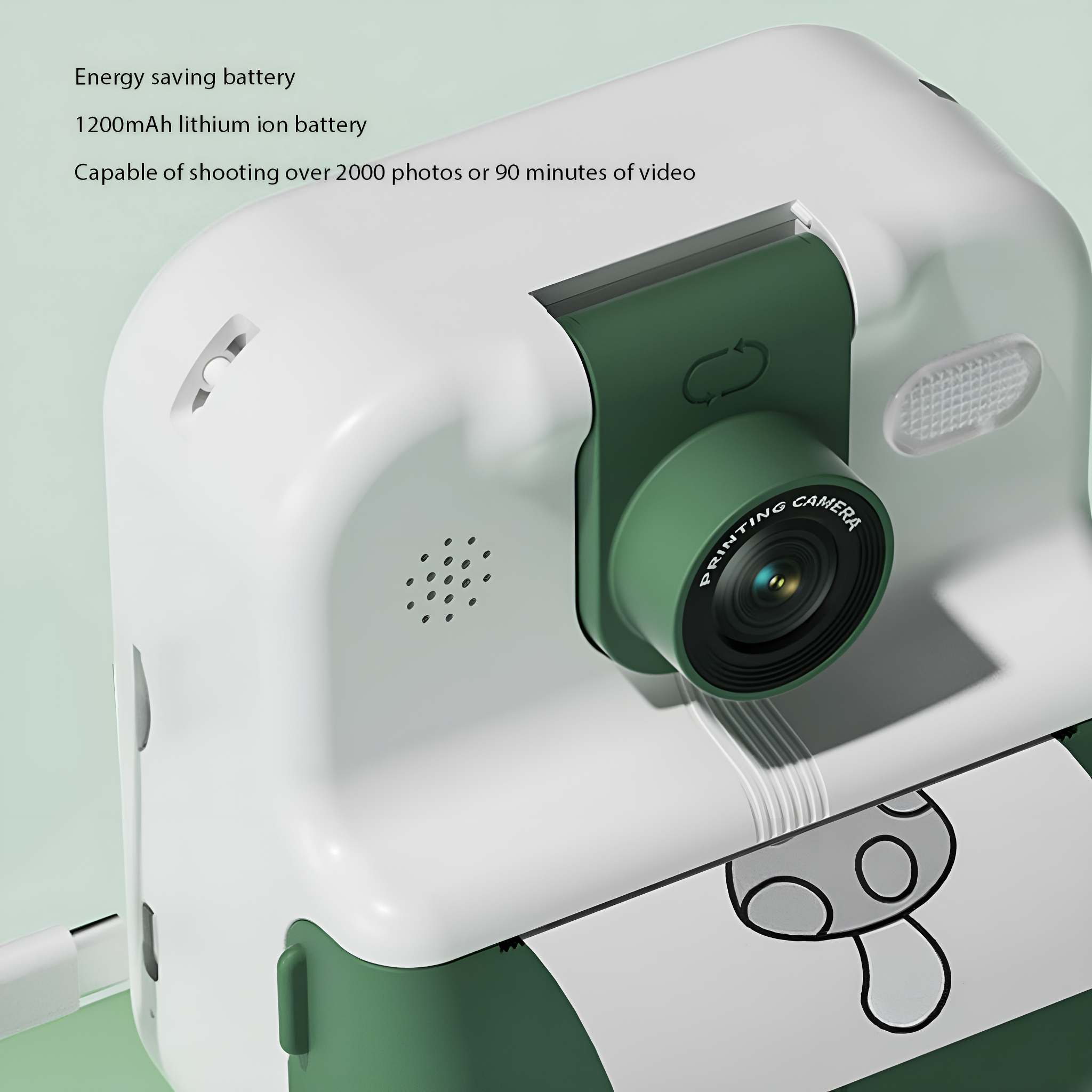 Weiß-grüne Sofortbildkamera mit Objektiv und Druckdesign. Text über Akku und Fotos.