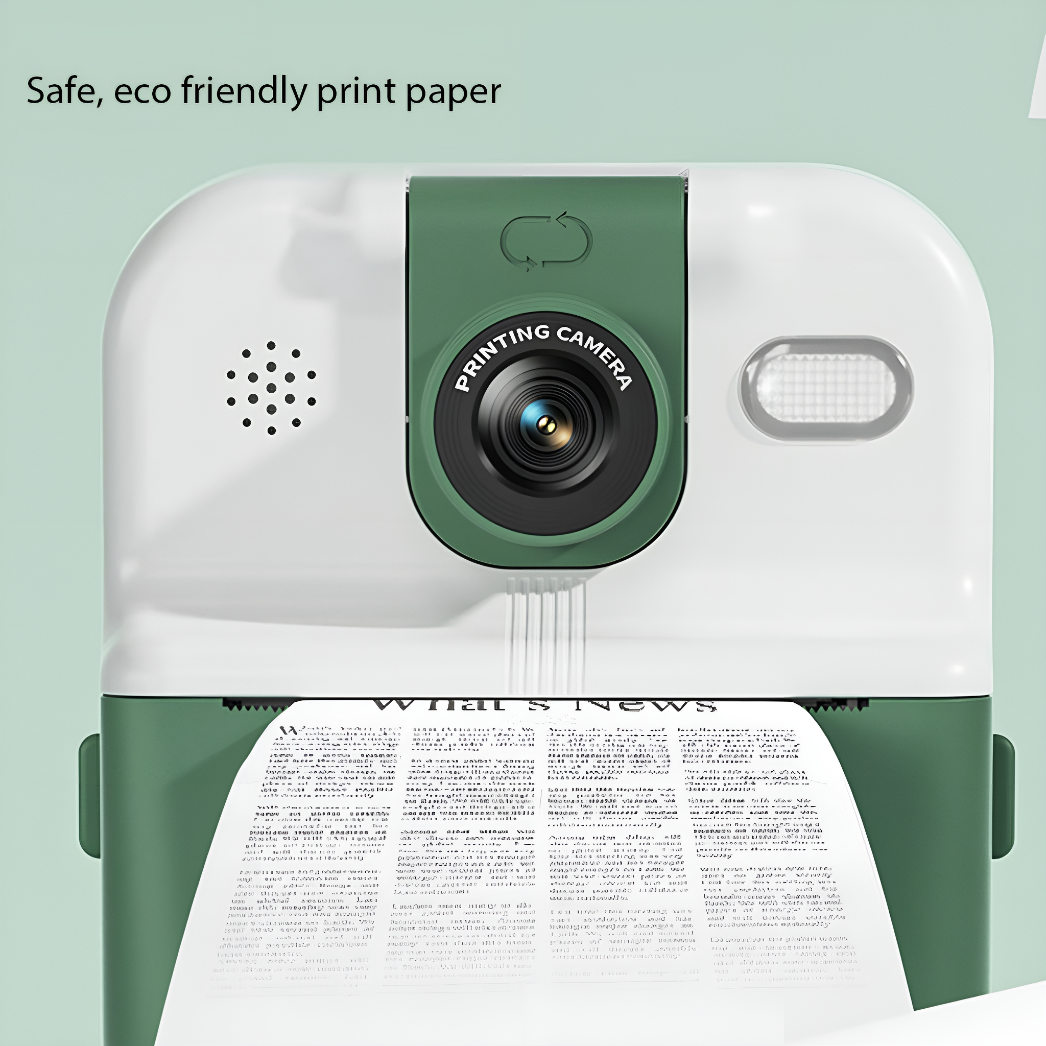 Eine grün-weiße Druckkamera mit einer Papierrolle. Auf dem Papier steht 'What's News'.
