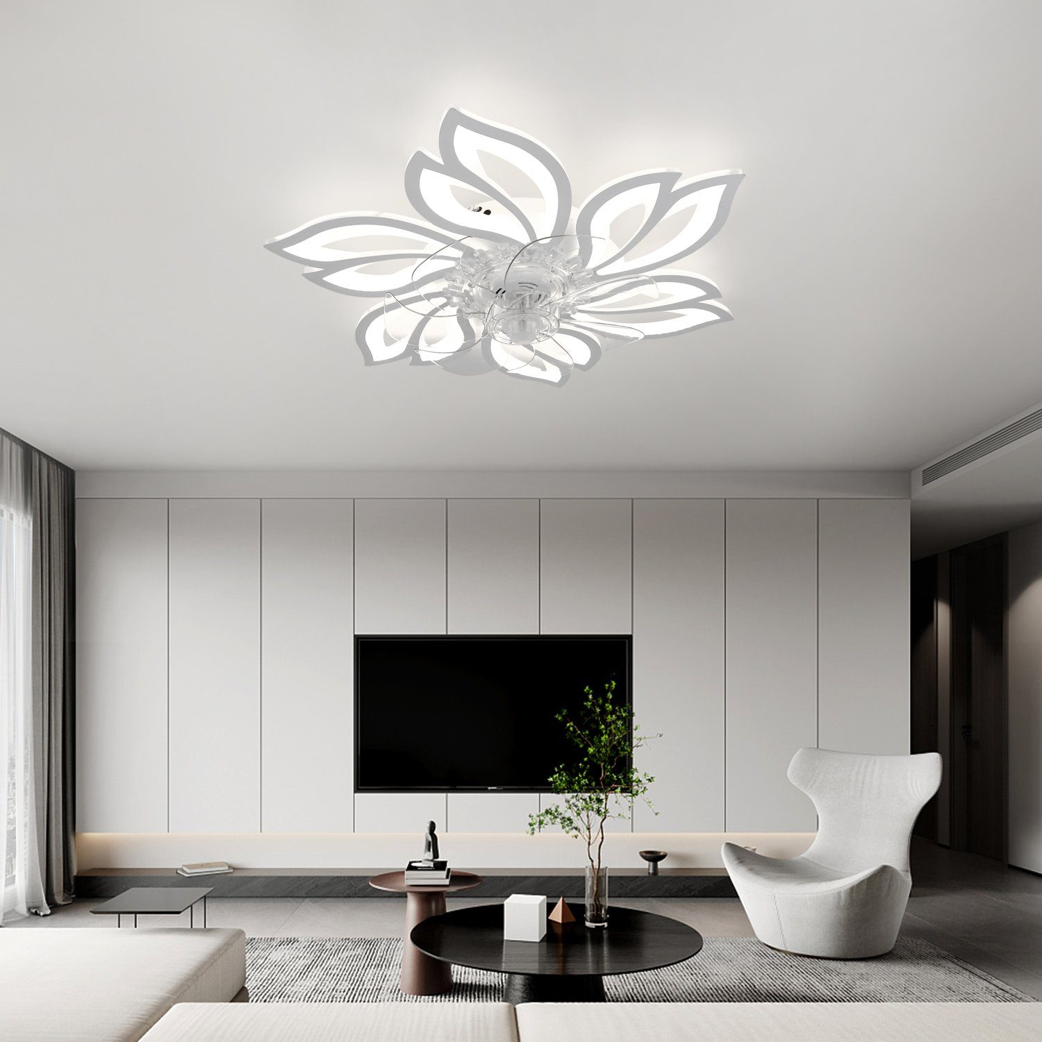 Una plafoniera a forma di fiore in una moderna stanza bianca con una TV nera e mobili bianchi.