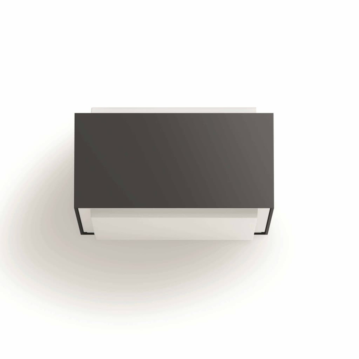 Luz de pared rectangular para exteriores, gris oscuro en la parte superior, blanco en la parte inferior, sobre un fondo blanco.