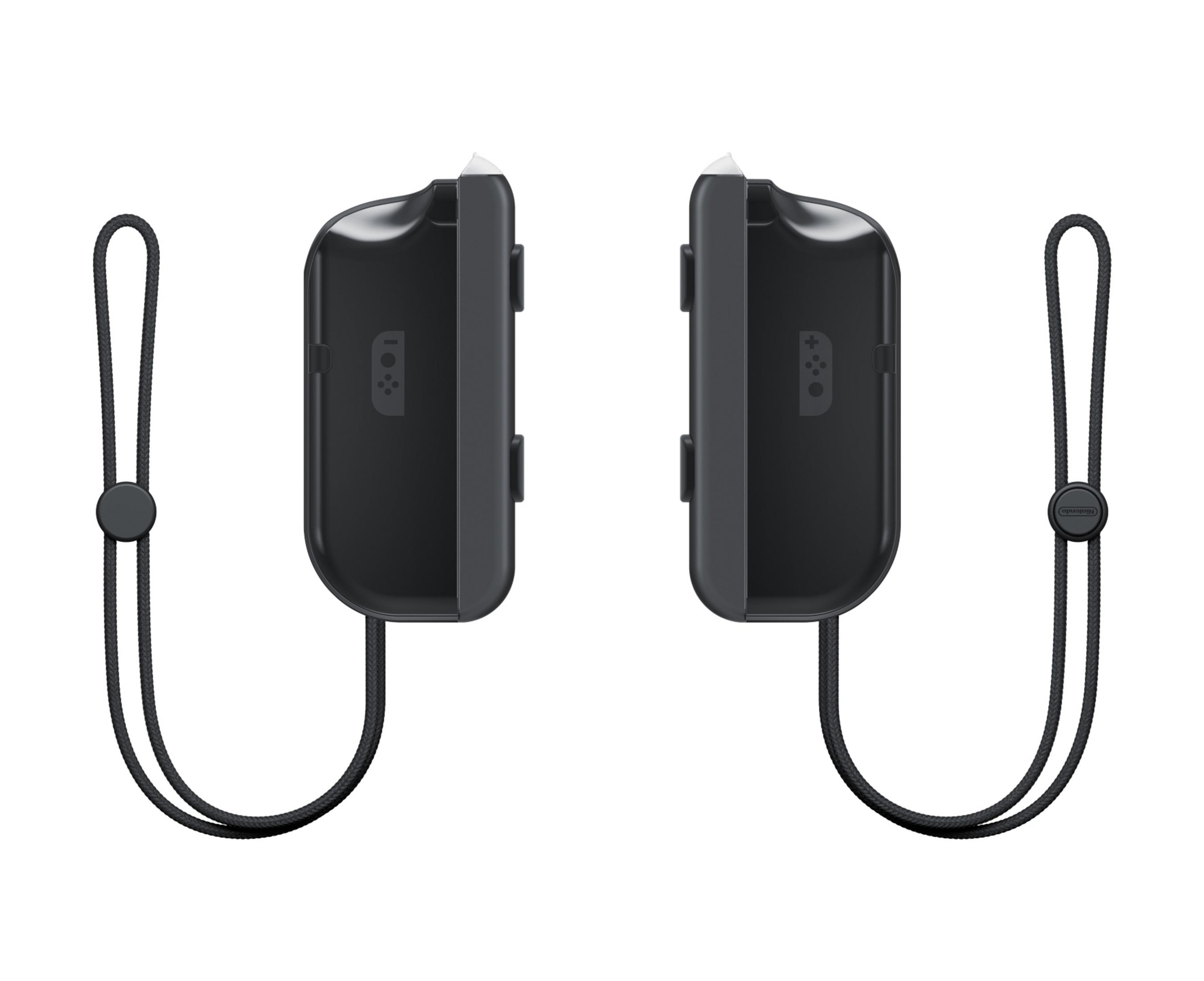 Dos mandos Joy-Con negros para una Nintendo Switch. Tienen correas de muñeca y botones.