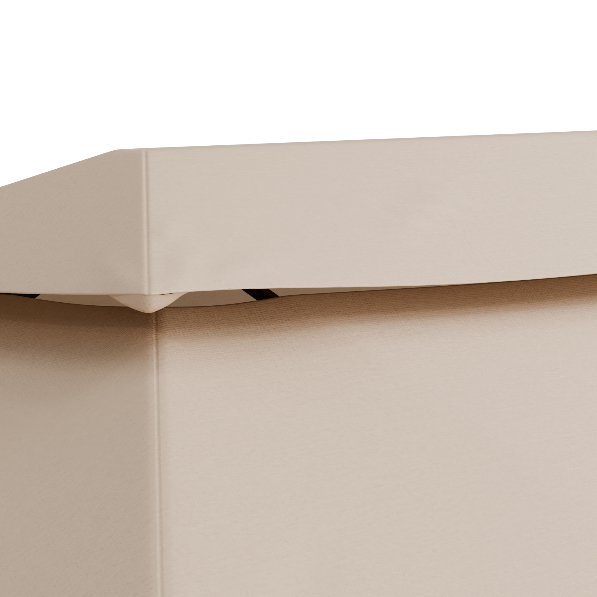 L'angolo di una scatola beige chiaro, angolata.