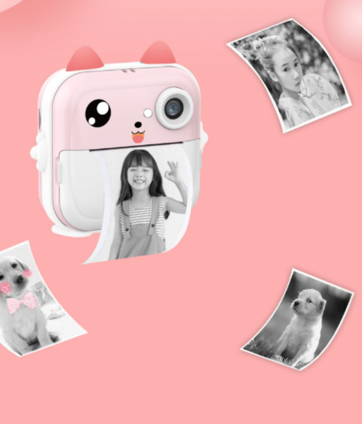 Rosa-weiße Kamera, die Fotos druckt. Fotos von Mädchen und Hunden sind sichtbar.
