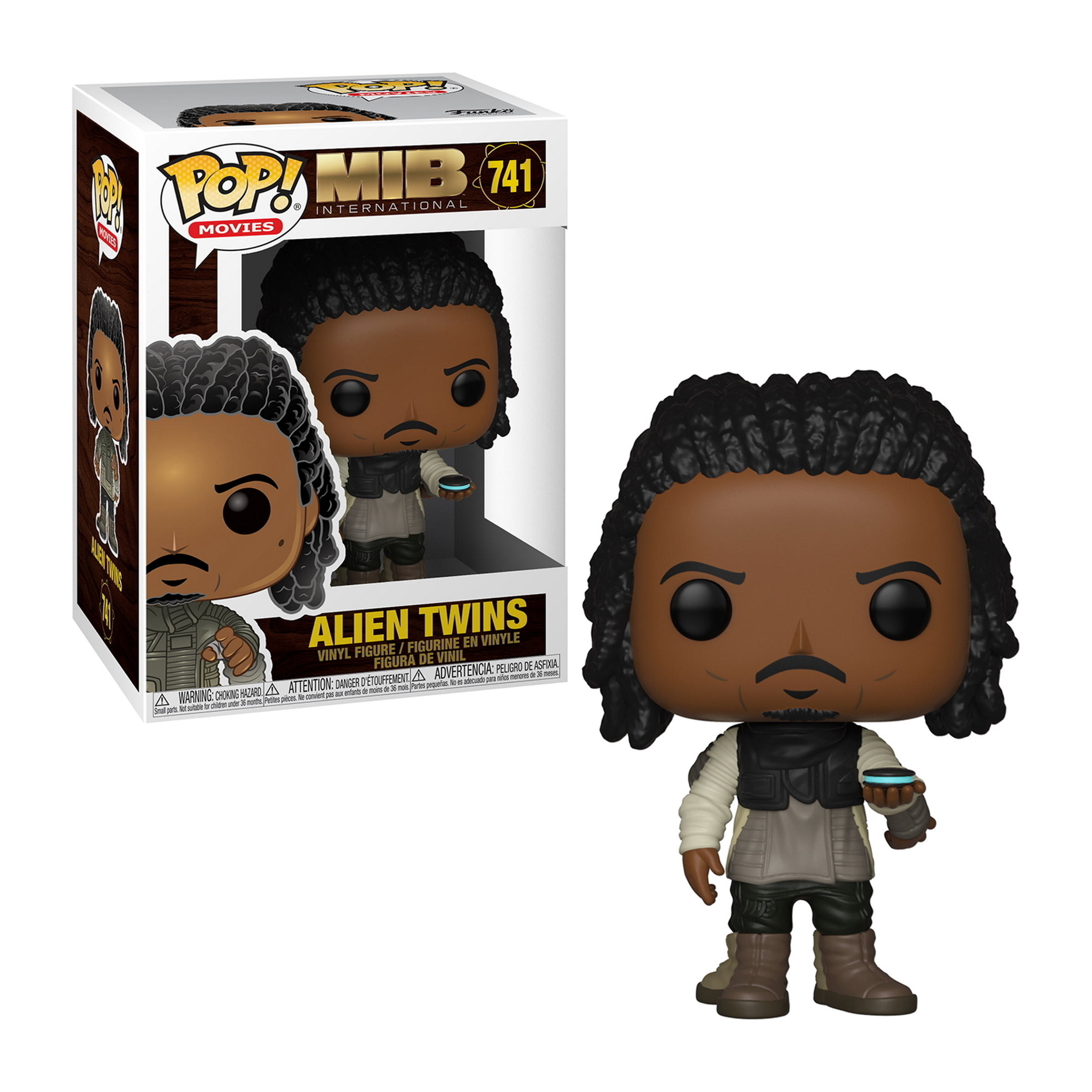 Figurka Funko Pop Alien Twins z Men in Black. Figurka jest czarna i ma pudełko.