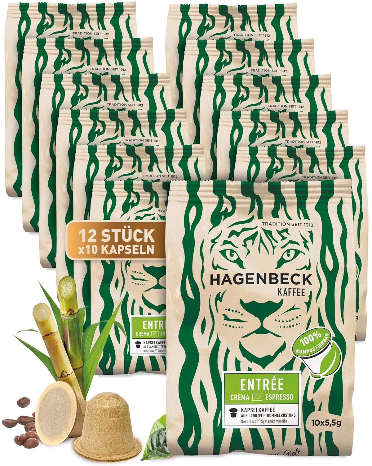 Kaffeekapseln in einer Schachtel mit grünem Design und einem Löwen. Sie sind auf weißem Grund.