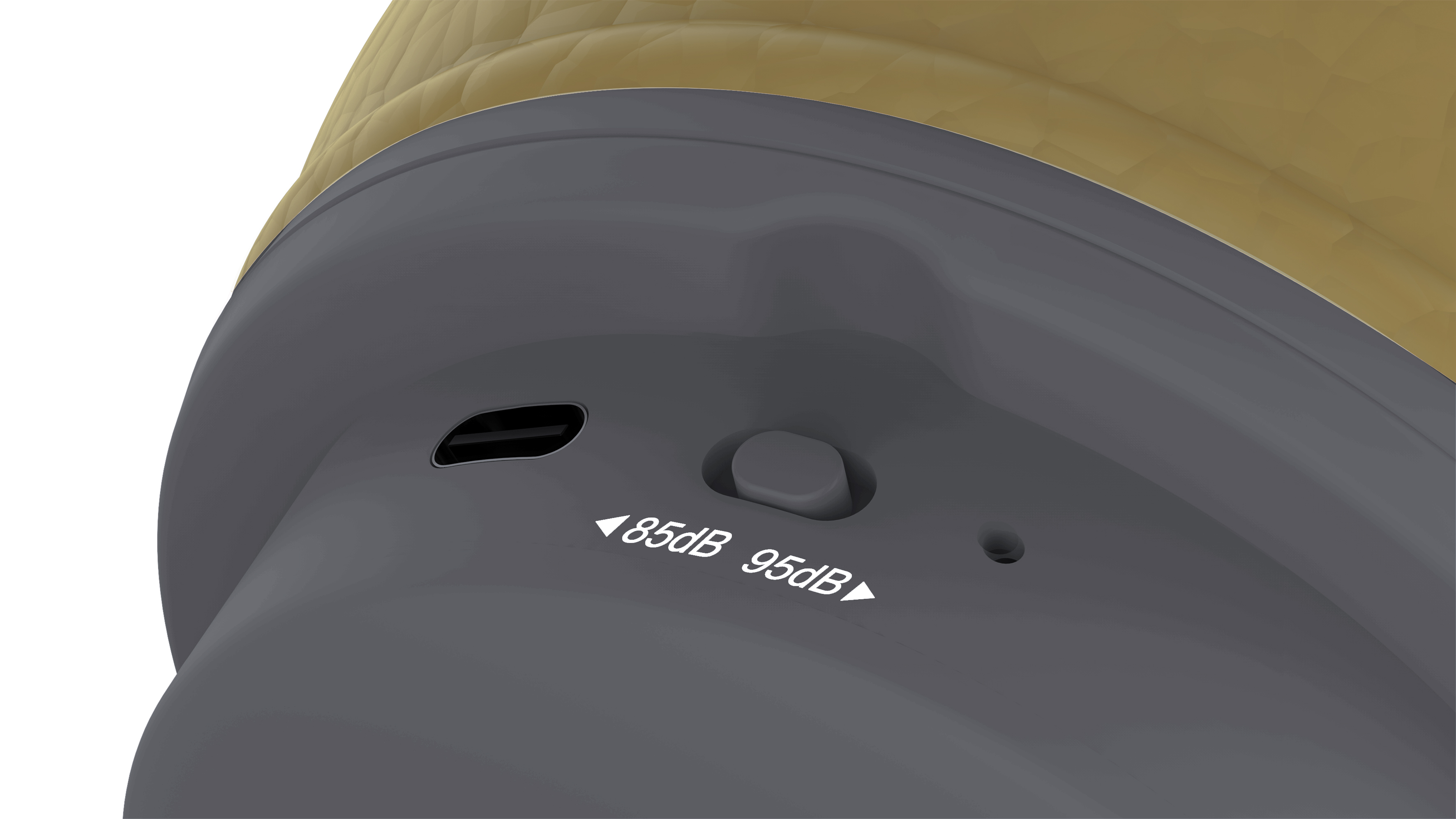 Close-up van een grijs bedieningspaneel van een hoofdtelefoon met twee volume-instellingen en een oplaadpoort.