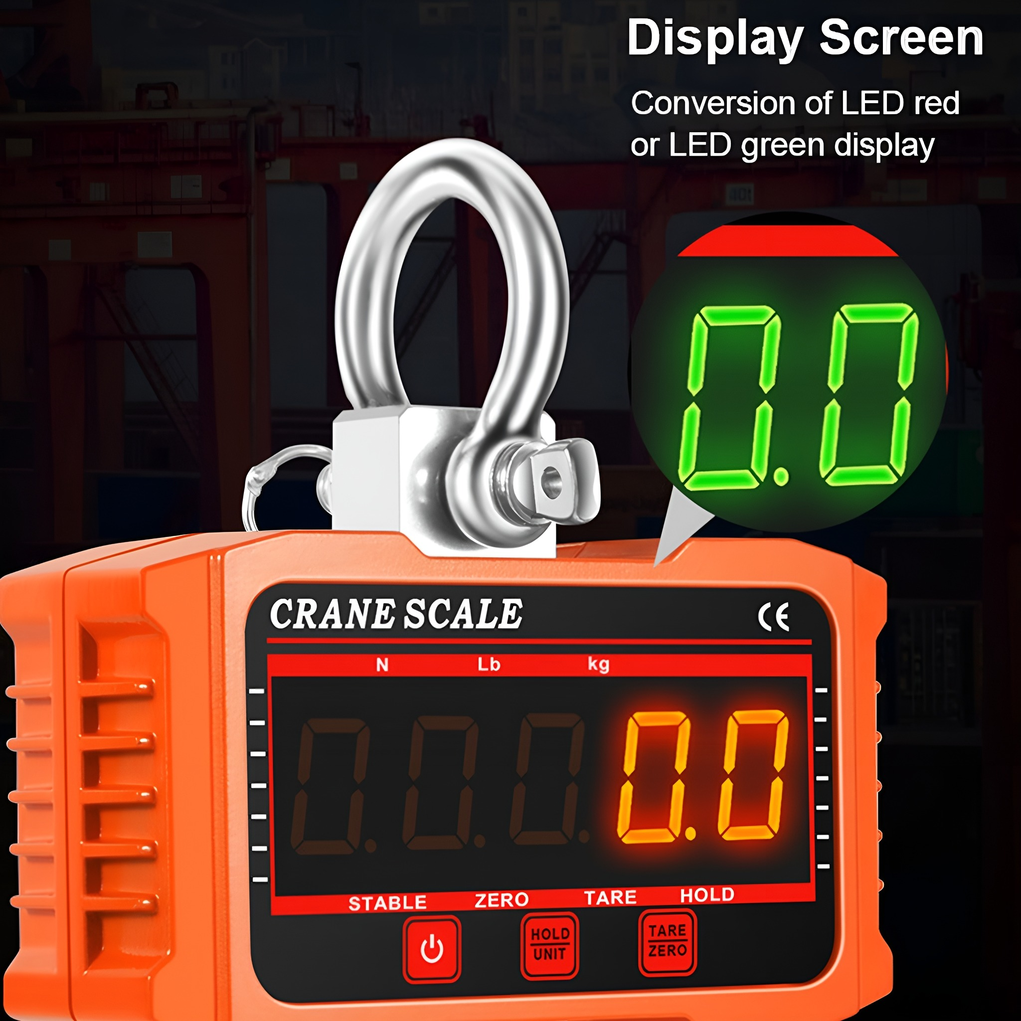 Orange Kranwaage mit digitaler Anzeige und grüner LED-Anzeige mit 0,0, mit schwarzem Hintergrund.