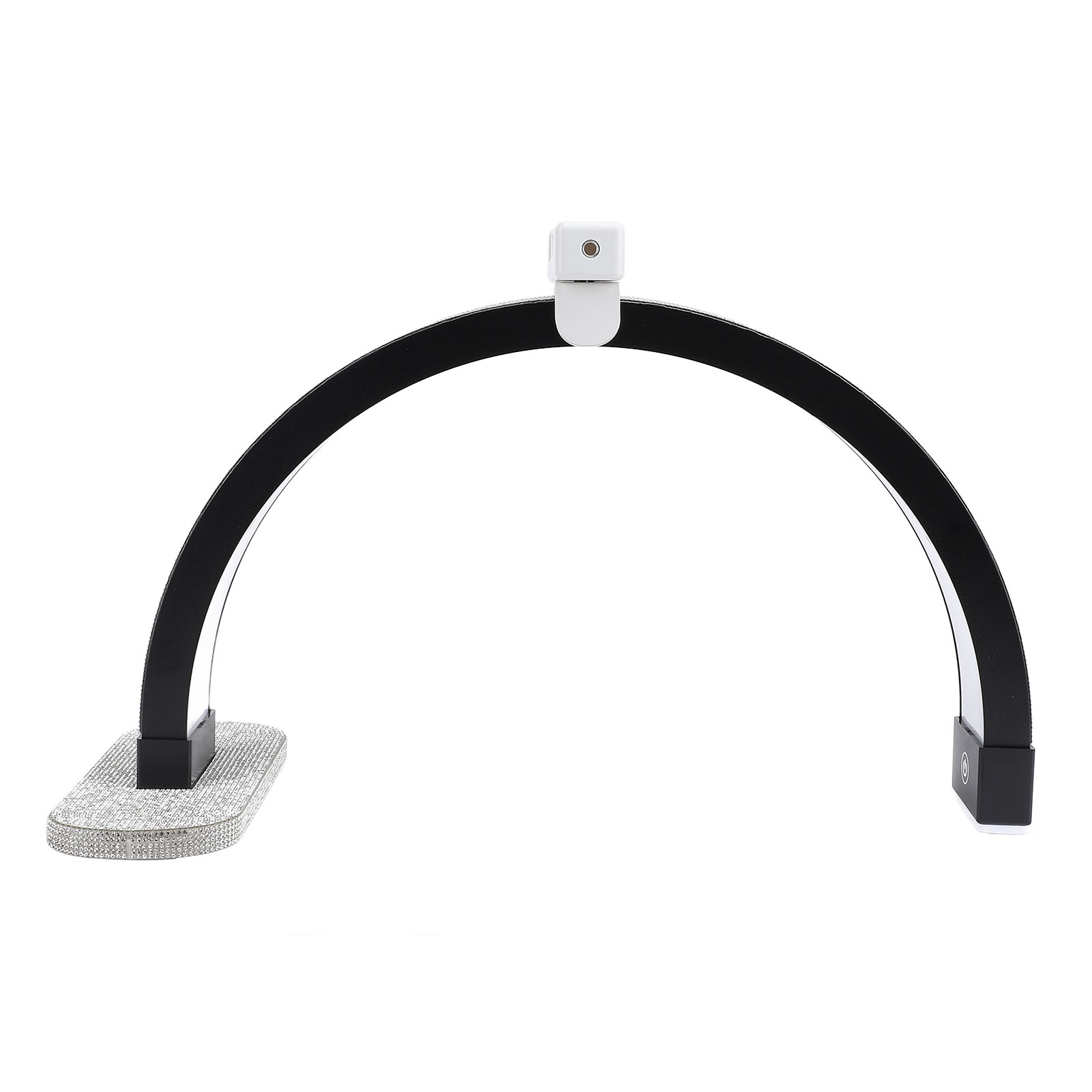 Eine moderne schwarze, bogenförmige Schreibtischlampe mit grauem Sockel und weißer Lichtquelle.