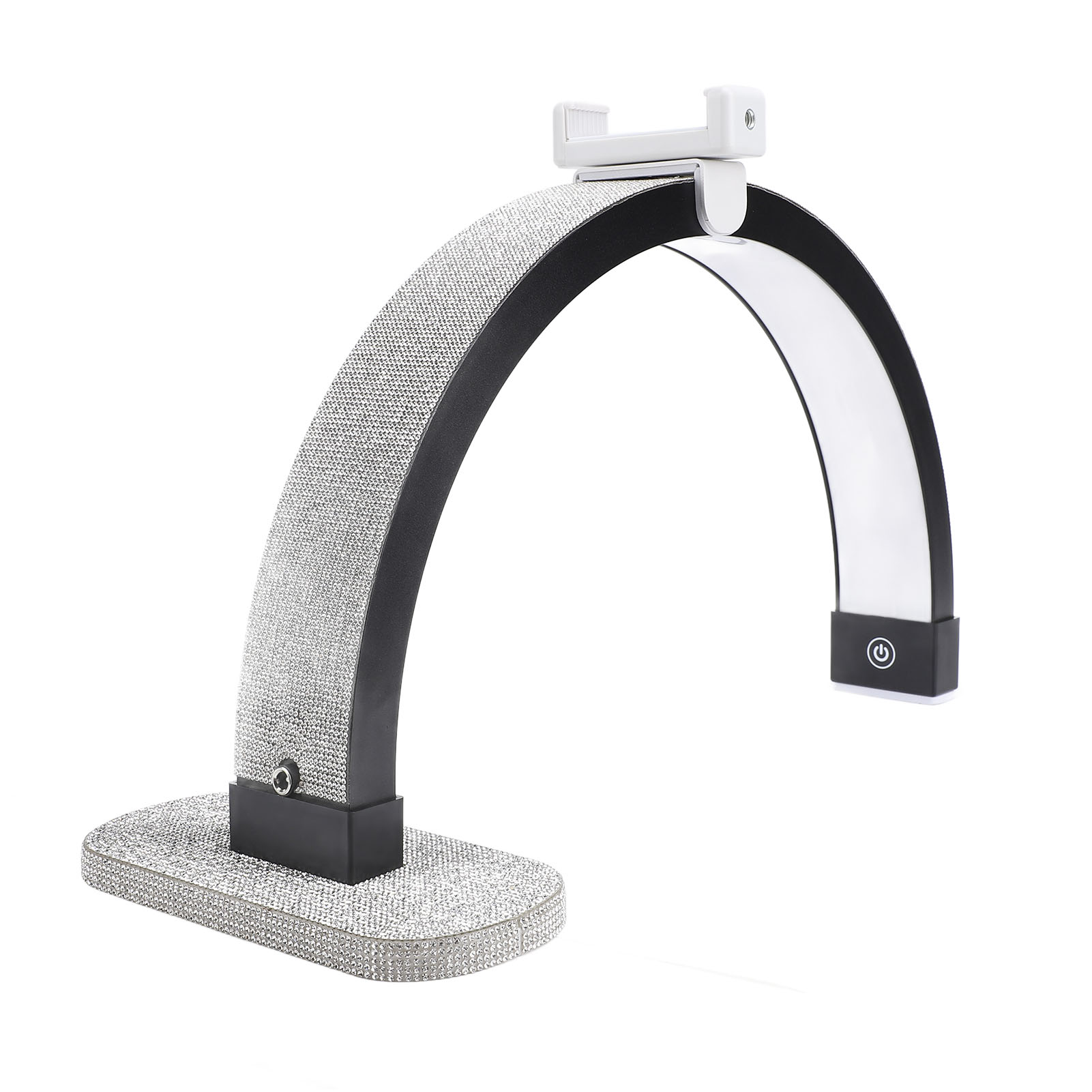 Dekorative, bogenförmige Lampe mit Strass-besetztem Sockel und Licht.