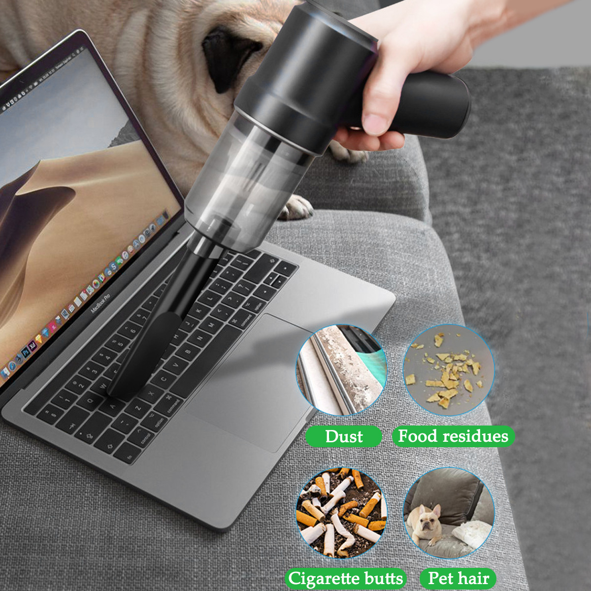Ein Handstaubsauger reinigt einen Laptop. Trümmer wie Staub, Essen, Zigarettenkippen und Tierhaare sind in Kreisen.