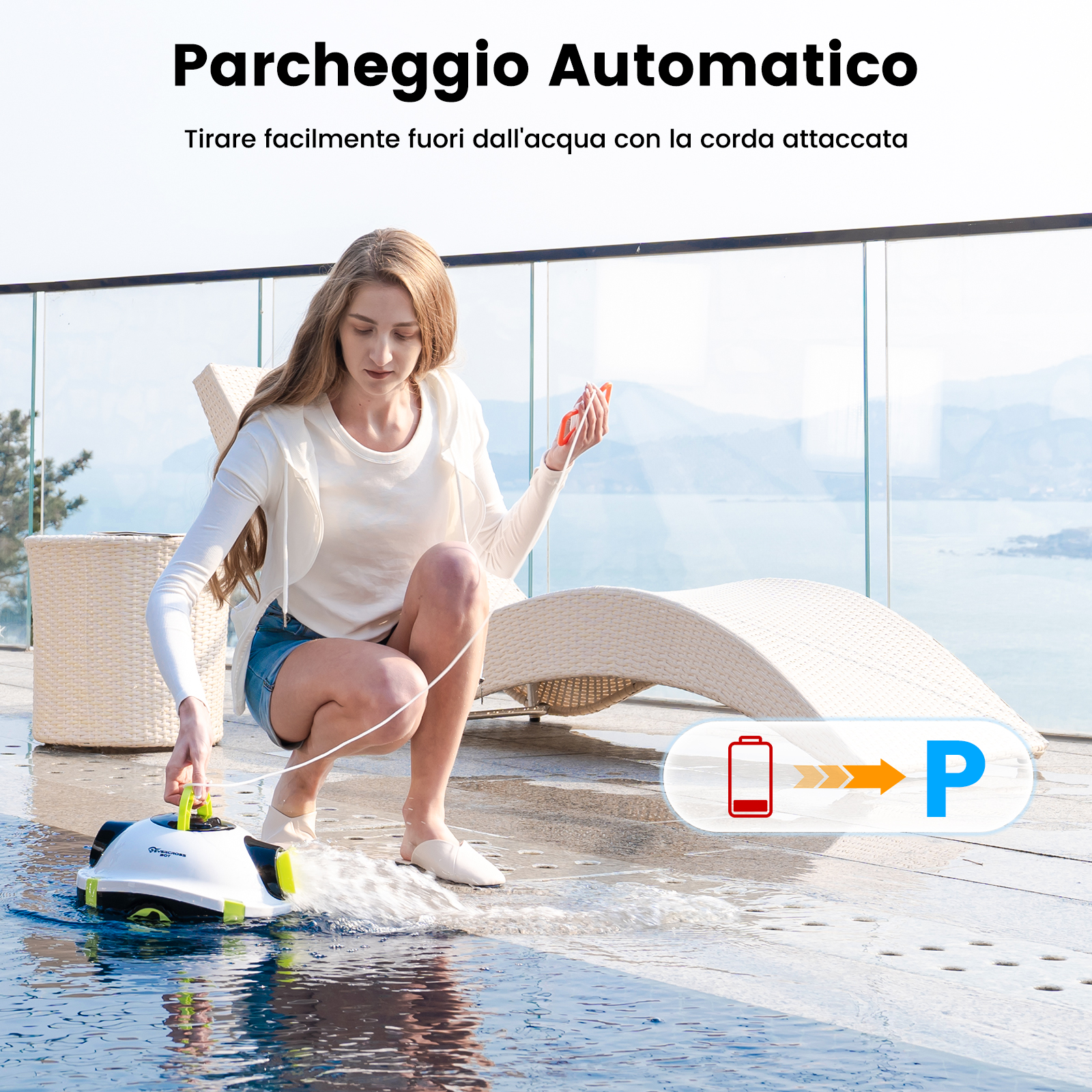 Una donna usa un pulitore per piscina robotico, tirandolo fuori dall'acqua.