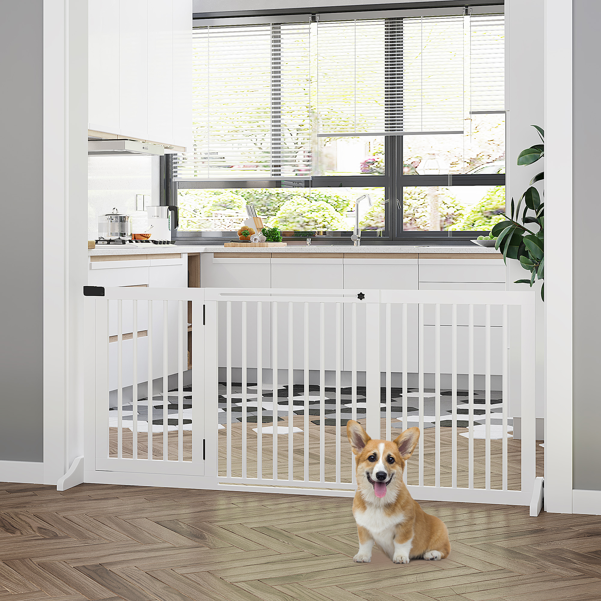Una barrera para bebés blanca en la puerta de una cocina. Un perro corgi está en primer plano.