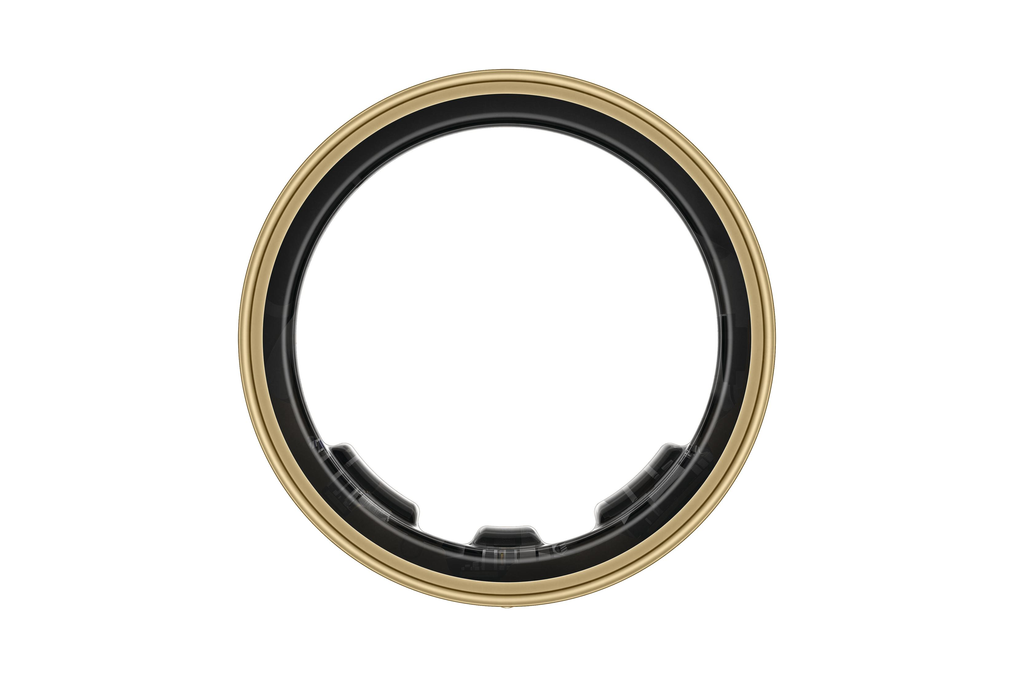Ein goldener und schwarzer Smartring. Er hat ein kreisförmiges Design.