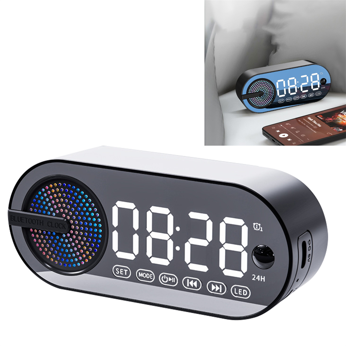 Ein digitaler Wecker mit Lautsprecher und Smartphone auf einem Bett.