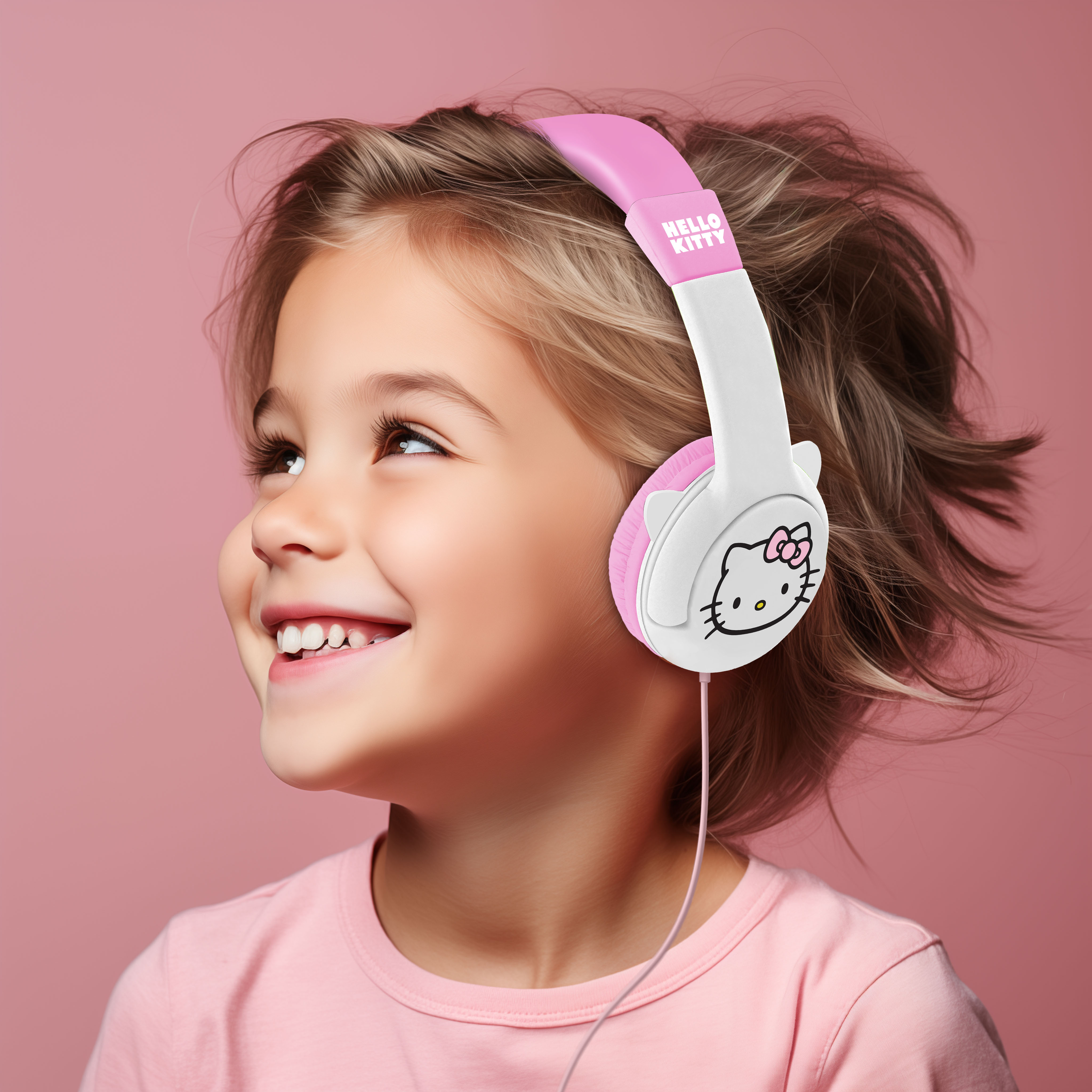 A girl with Hello Kitty headphones looks up, pink background.