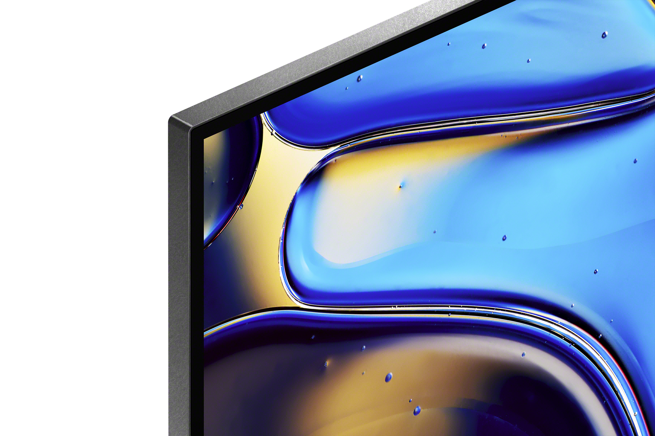 Zbliżenie rogu telewizora. Ekran wyświetla niebieskie i żółte abstrakcyjne kształty.