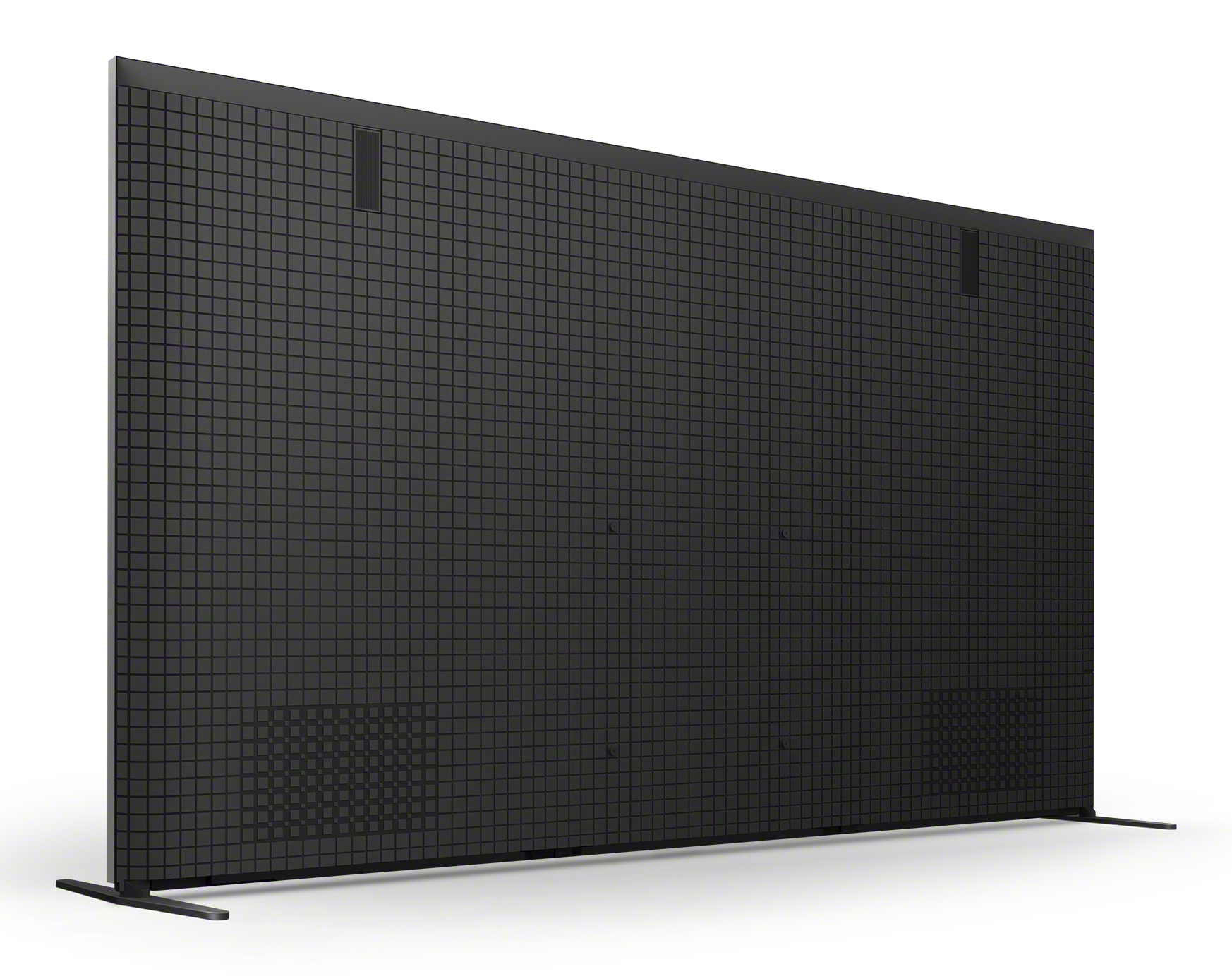 Un grand téléviseur noir avec un motif en grille à l'arrière.