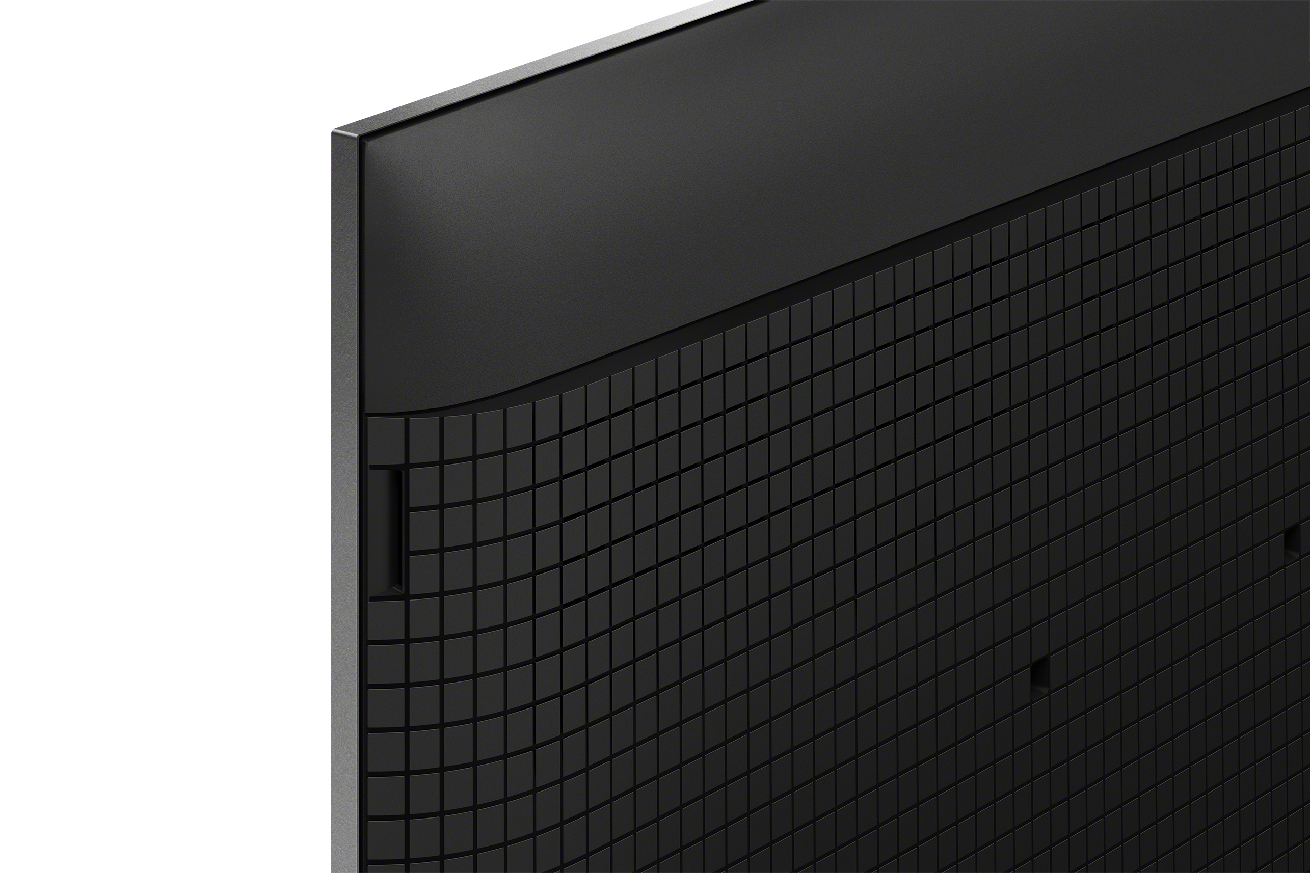 Zbliżenie tyłu czarnego telewizora z teksturowanym wzorem w kratkę i zakrzywioną krawędzią.