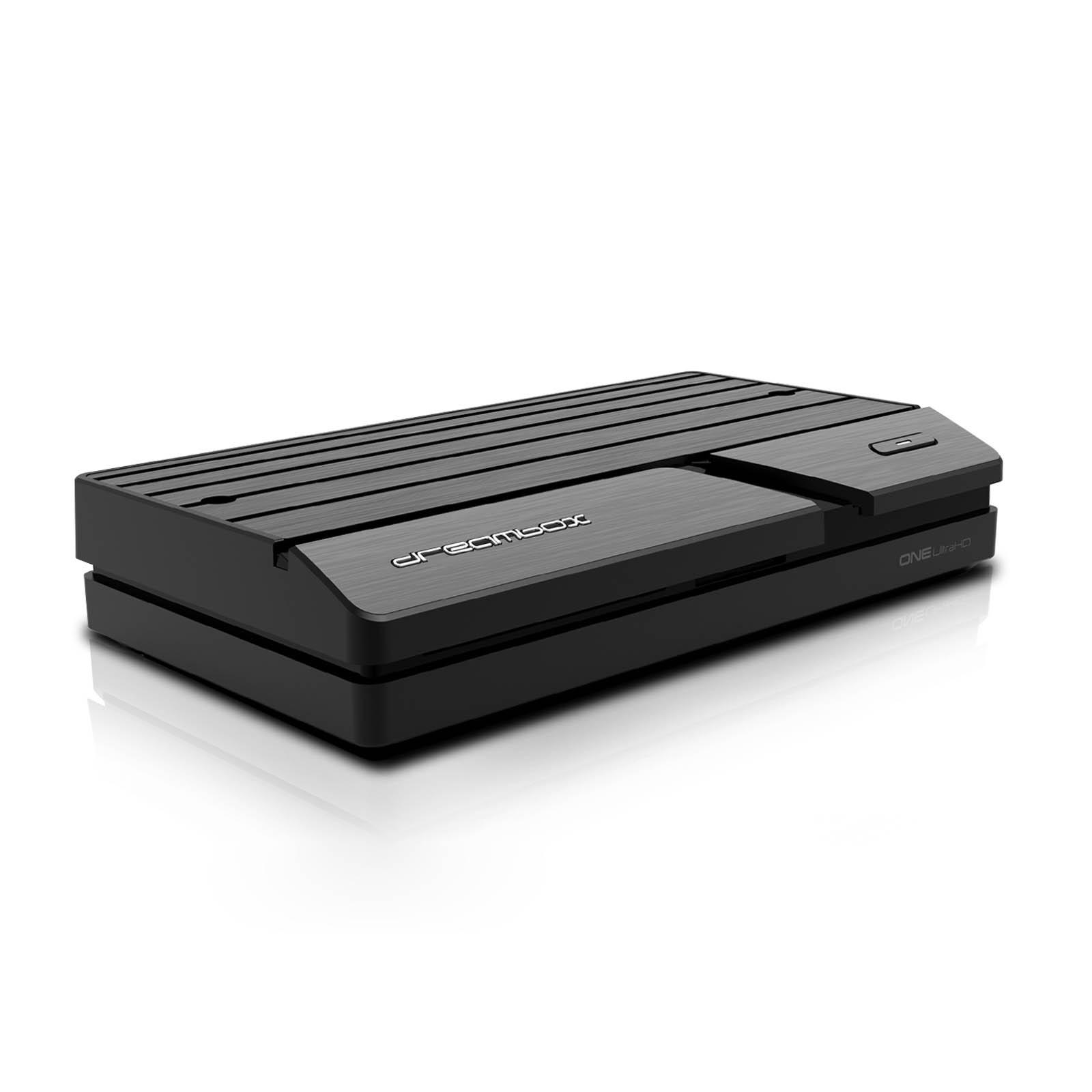 Schwarze rechteckige Set-Top-Box mit DreamBox-Logo. Angesicht auf weißer Oberfläche, leichte Reflexion.