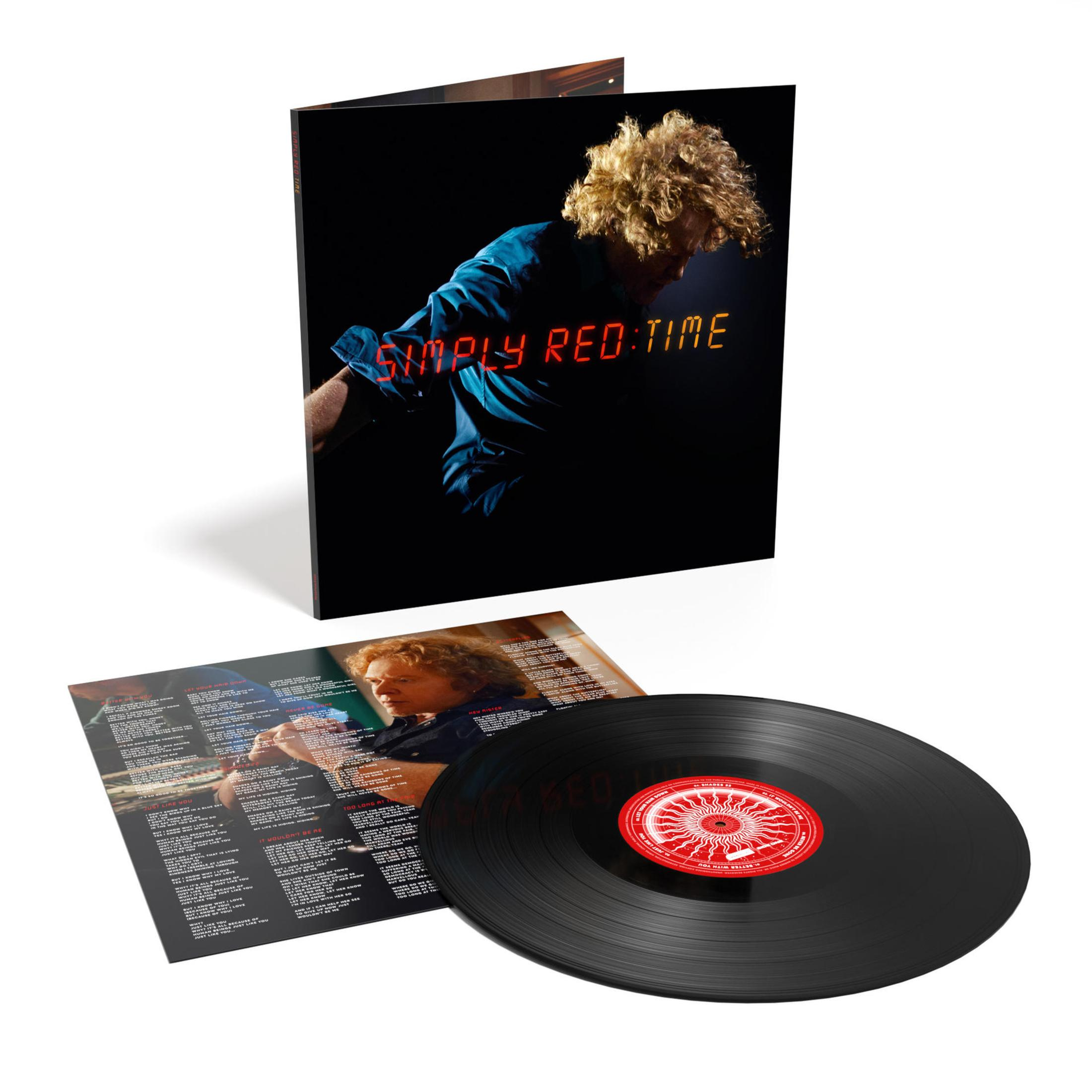 Copertina dell'album Simply Red con un uomo in camicia blu. Sono inclusi un vinile e i testi.
