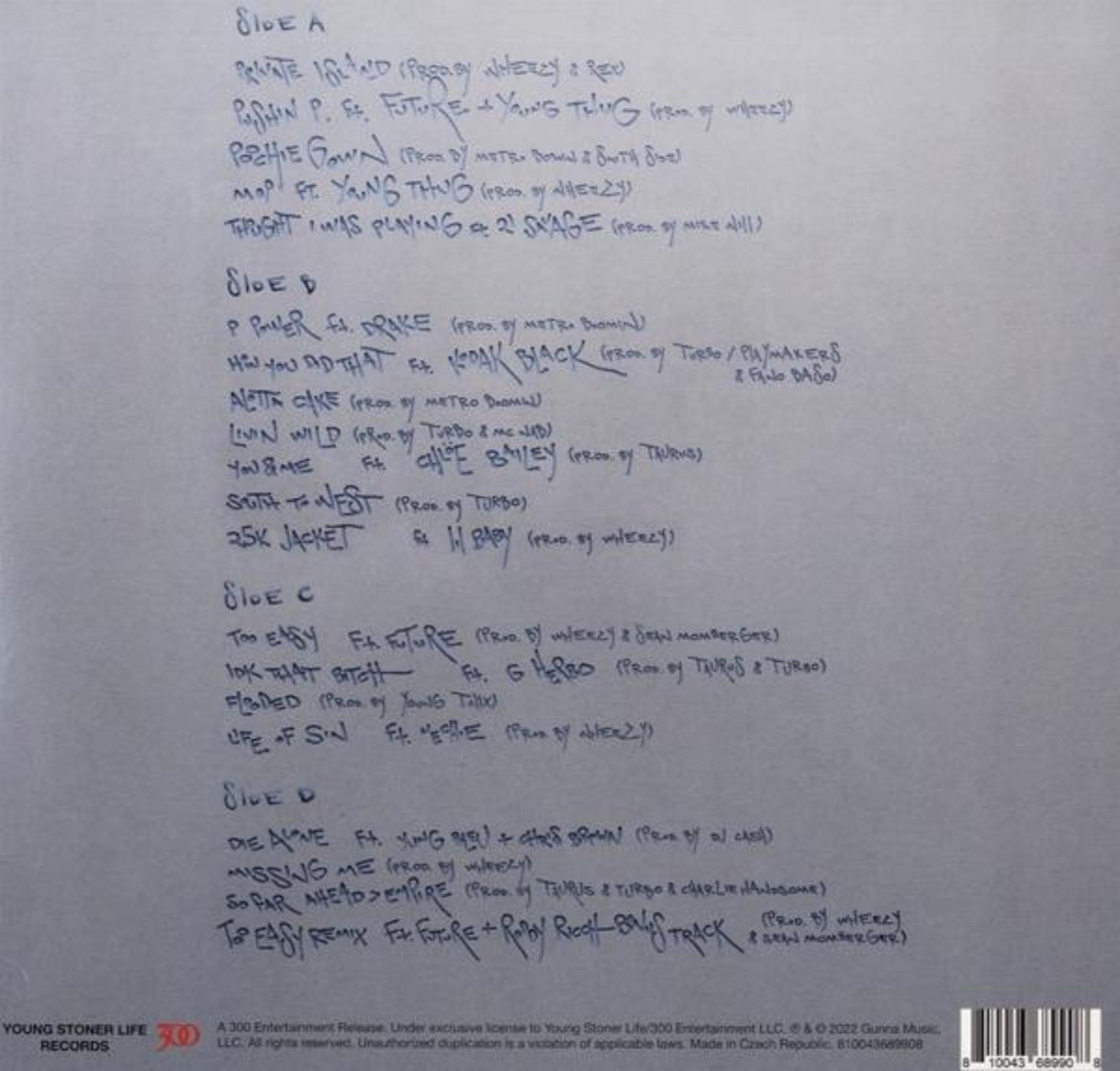Tracklist. Elenco delle canzoni sui lati A, B, C e D. Stile scritto a mano.