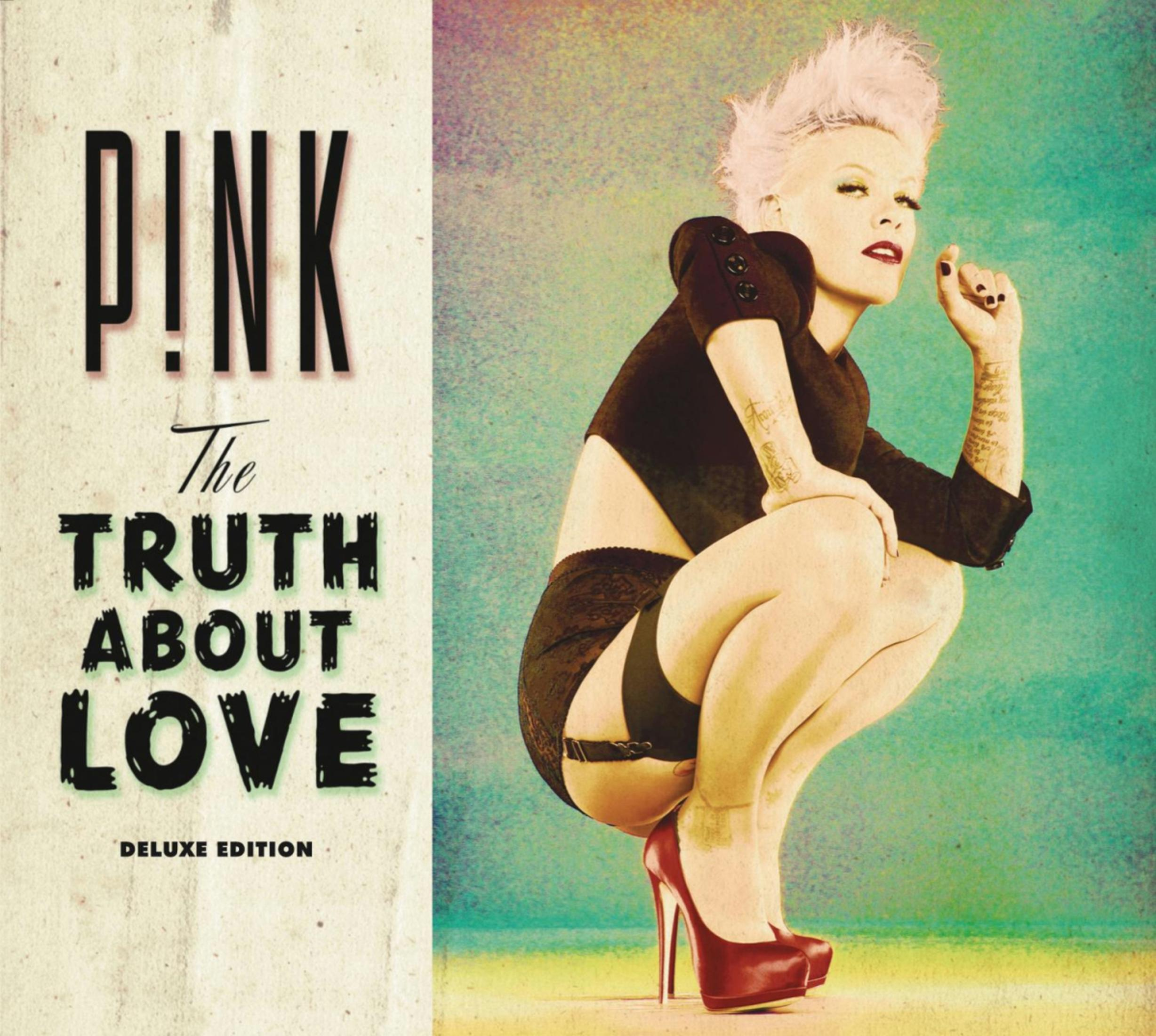 Copertina dell'album di P!nk con una donna in abito nero, tacchi rossi e un tatuaggio. Titolo dell'album visibile.