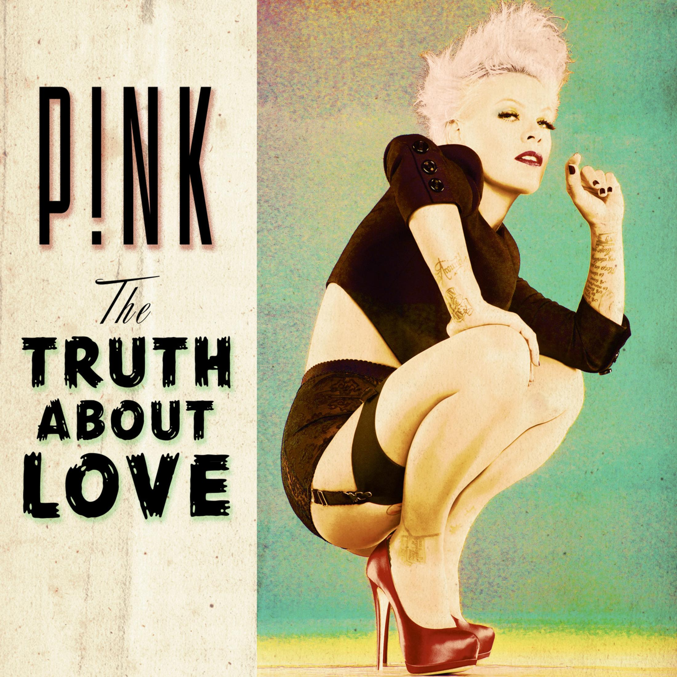 Copertina dell'album: P!nk in posa provocatoria, accovacciata, con tacchi alti, con testo.