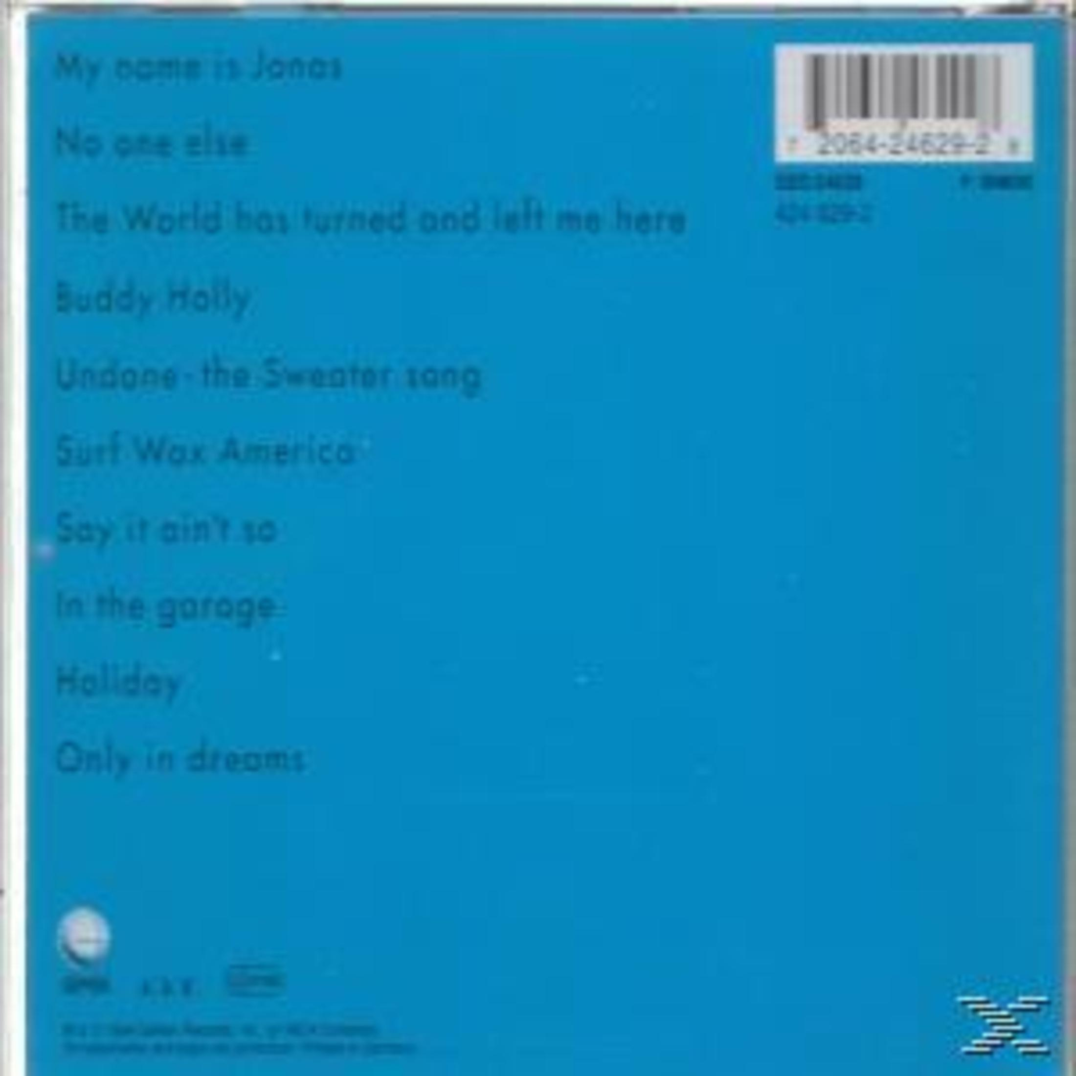 Retro copertina dell'album con tracklist e titolo su sfondo blu.