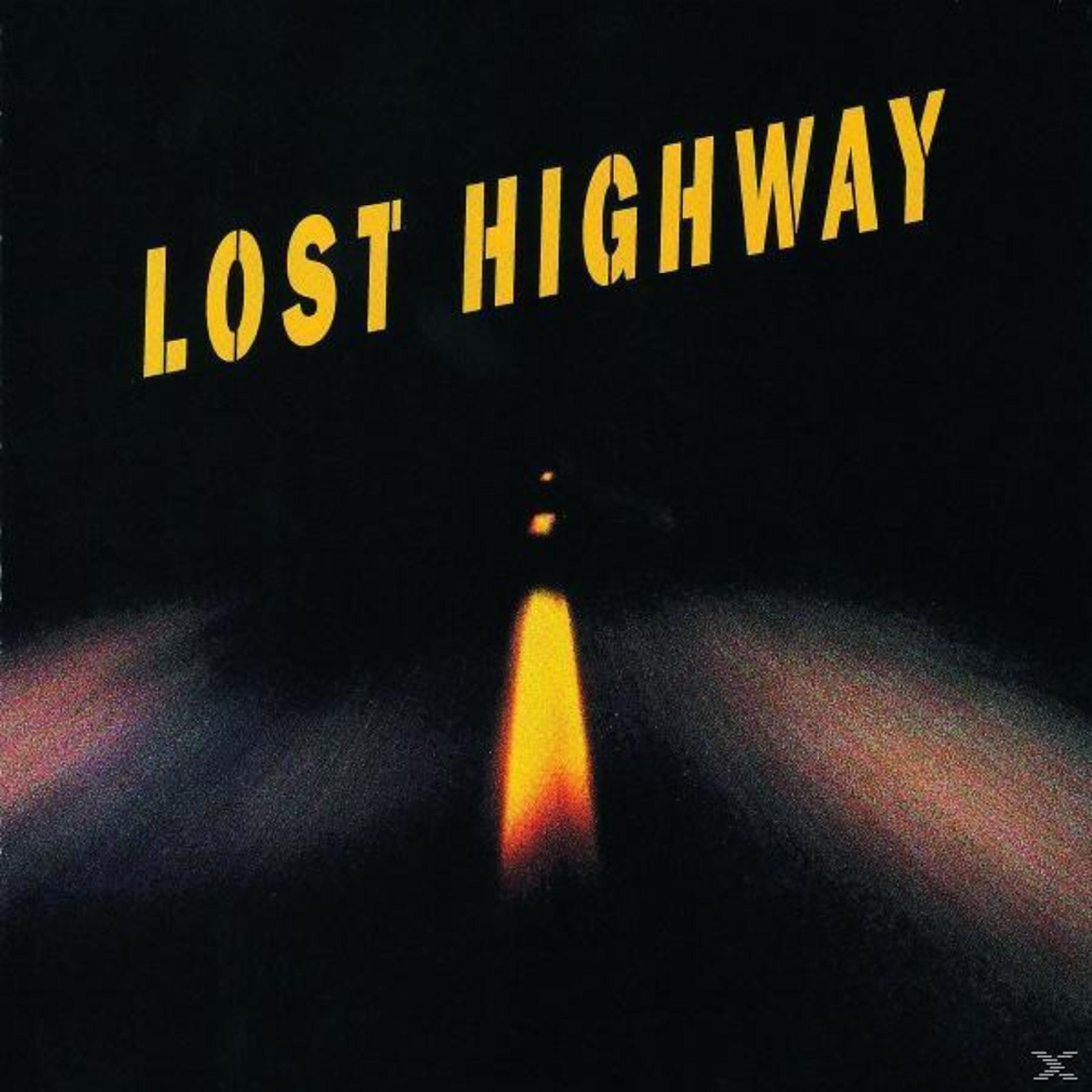 Copertina dell'album con le parole 'LOST HIGHWAY' su una strada con una luce intensa.