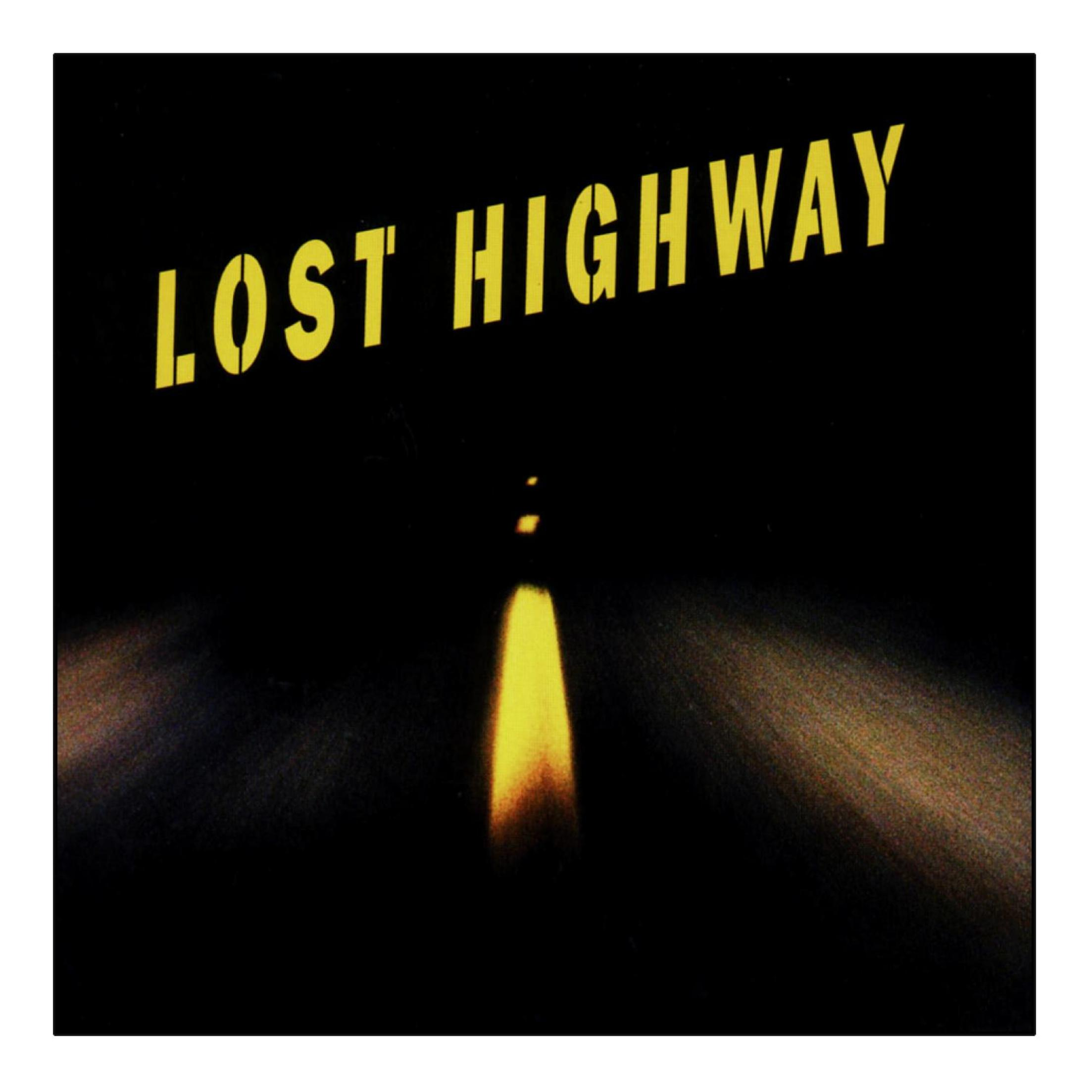 Copertina dell'album: una scena oscura con una strada luminosa e il testo LOST HIGHWAY.