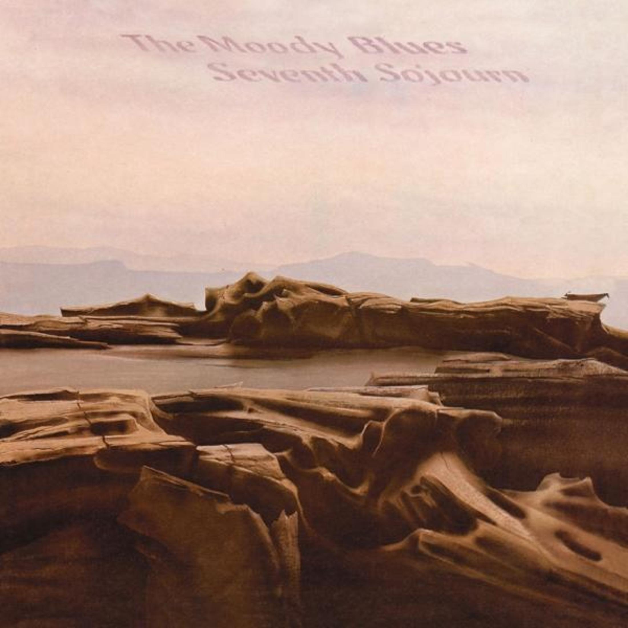 Copertina dell'album, The Moody Blues. Paesaggio roccioso e cielo nuvoloso.