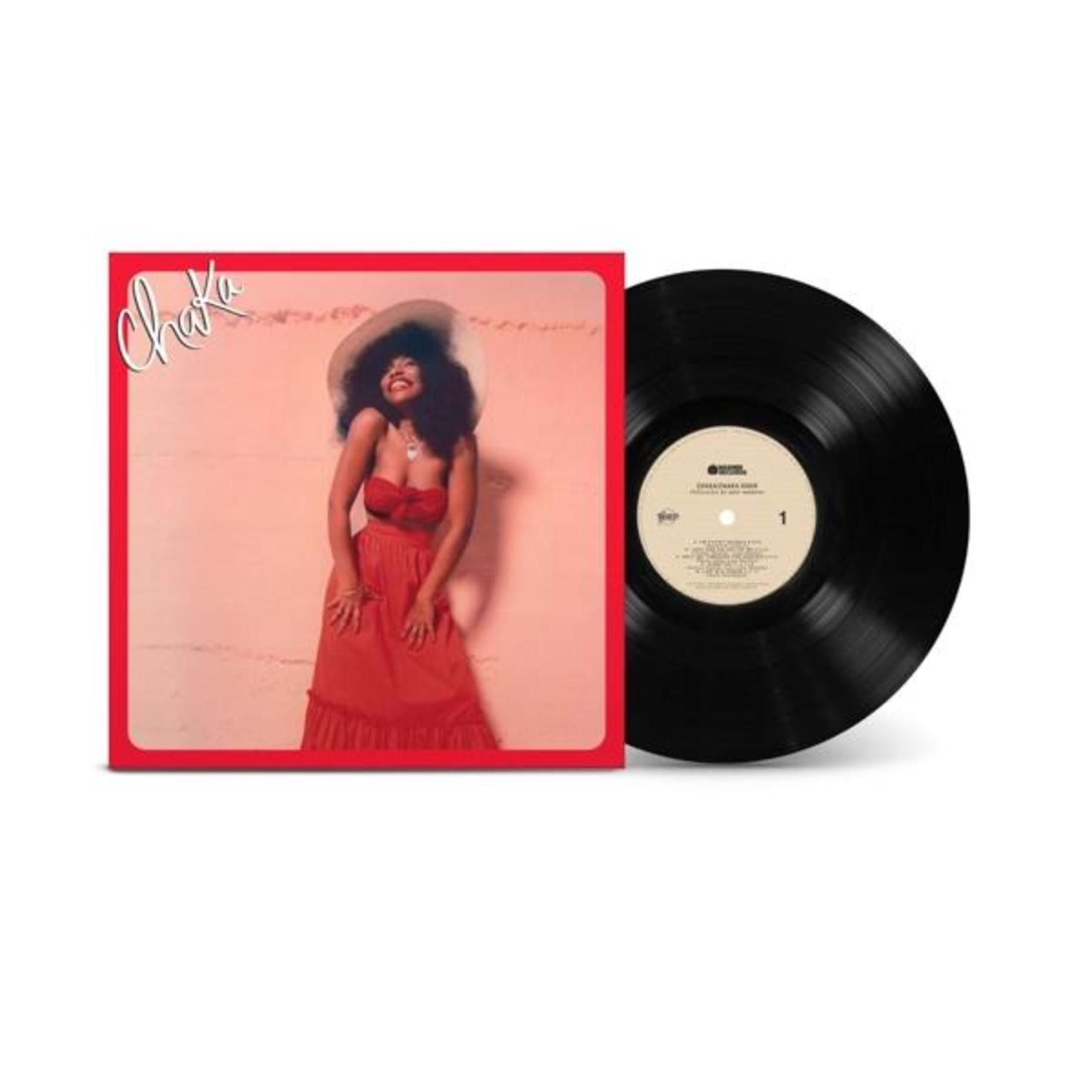 Copertina dell'album con donna in abito rosso e un disco in vinile.