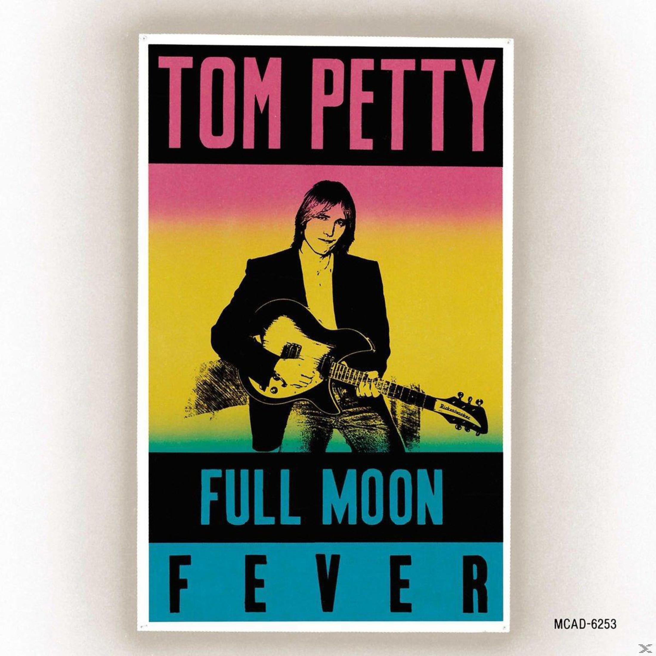 Copertina dell'album di Tom Petty. Uomo suona la chitarra. Il testo dice 'Full Moon Fever'.